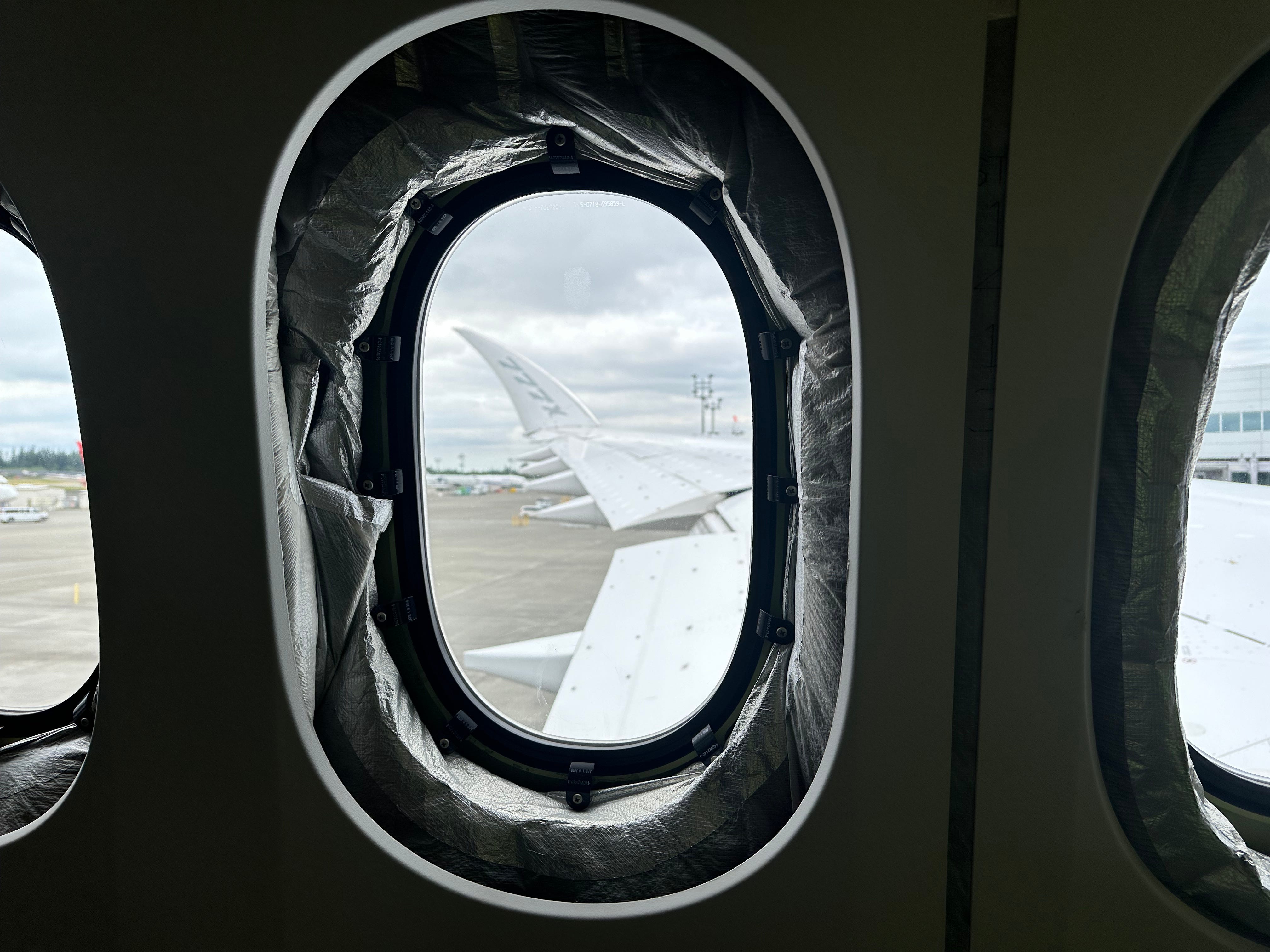 A view of the 777-9 test bed's folding wing from inside the aircraft.
