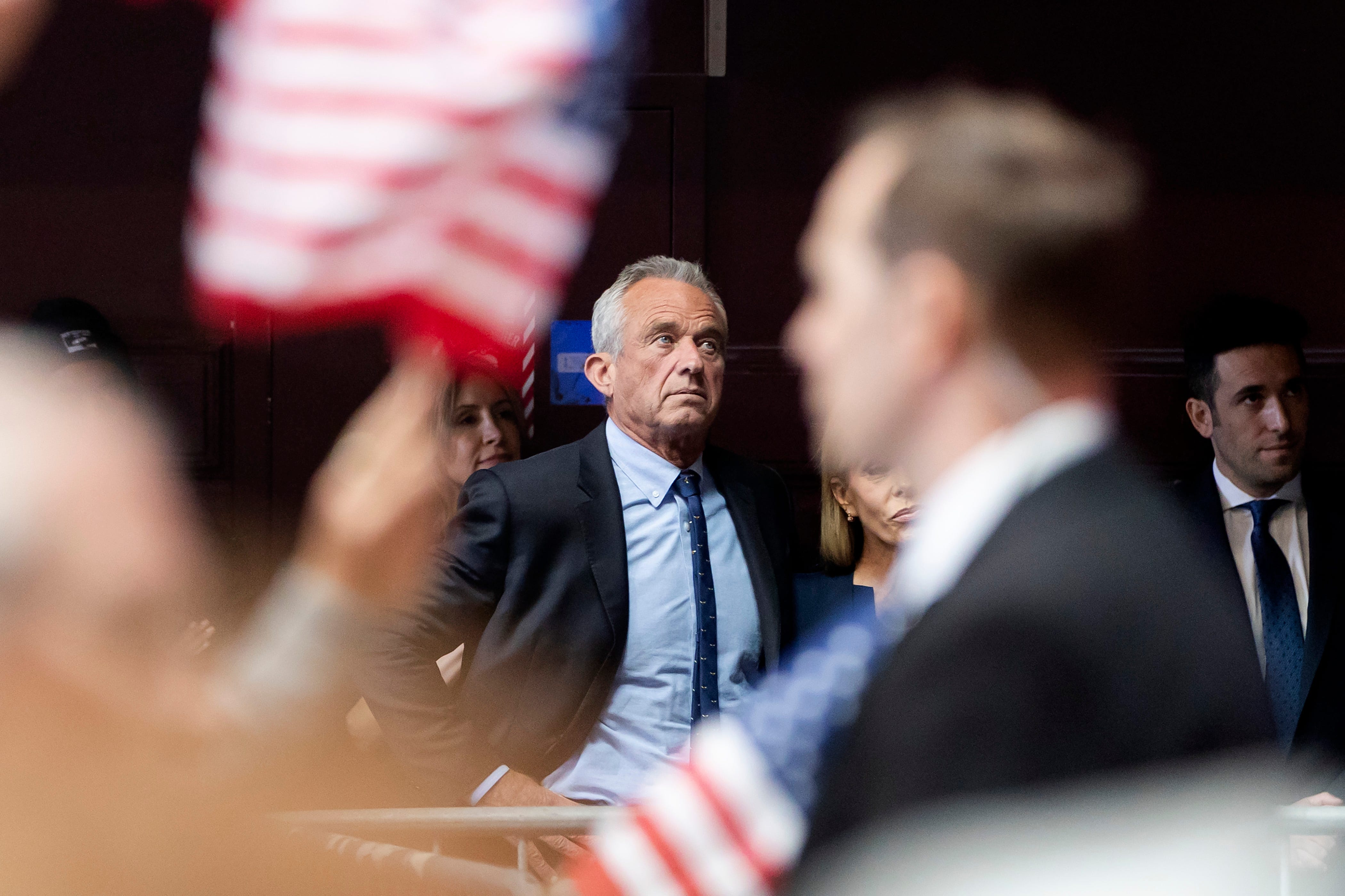 Mar 26, 2024; Oakland, CA, USA; Presidential candidate Robert F. Kennedy jr. watches off stage after announcing his Vice President representative as Nicole Shanahan during a rally at the Henry J. Kaiser Center for the Arts in Oakland, Calif. on Tuesday Mar 26, 2024; Oakland, California, United States; Mandatory Credit: Brittany Hosea-Small-USA TODAY