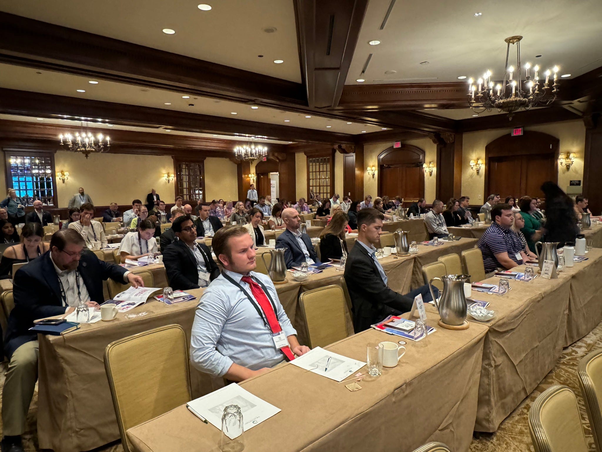 Attendees listen to a panel at the Conservative Energy Network, which held its first national summit in Houston August 19 through 21, 2024. The non-profit is a national network of state-based organizations focused on promoting clean energy innovation rooted in conservative values.
