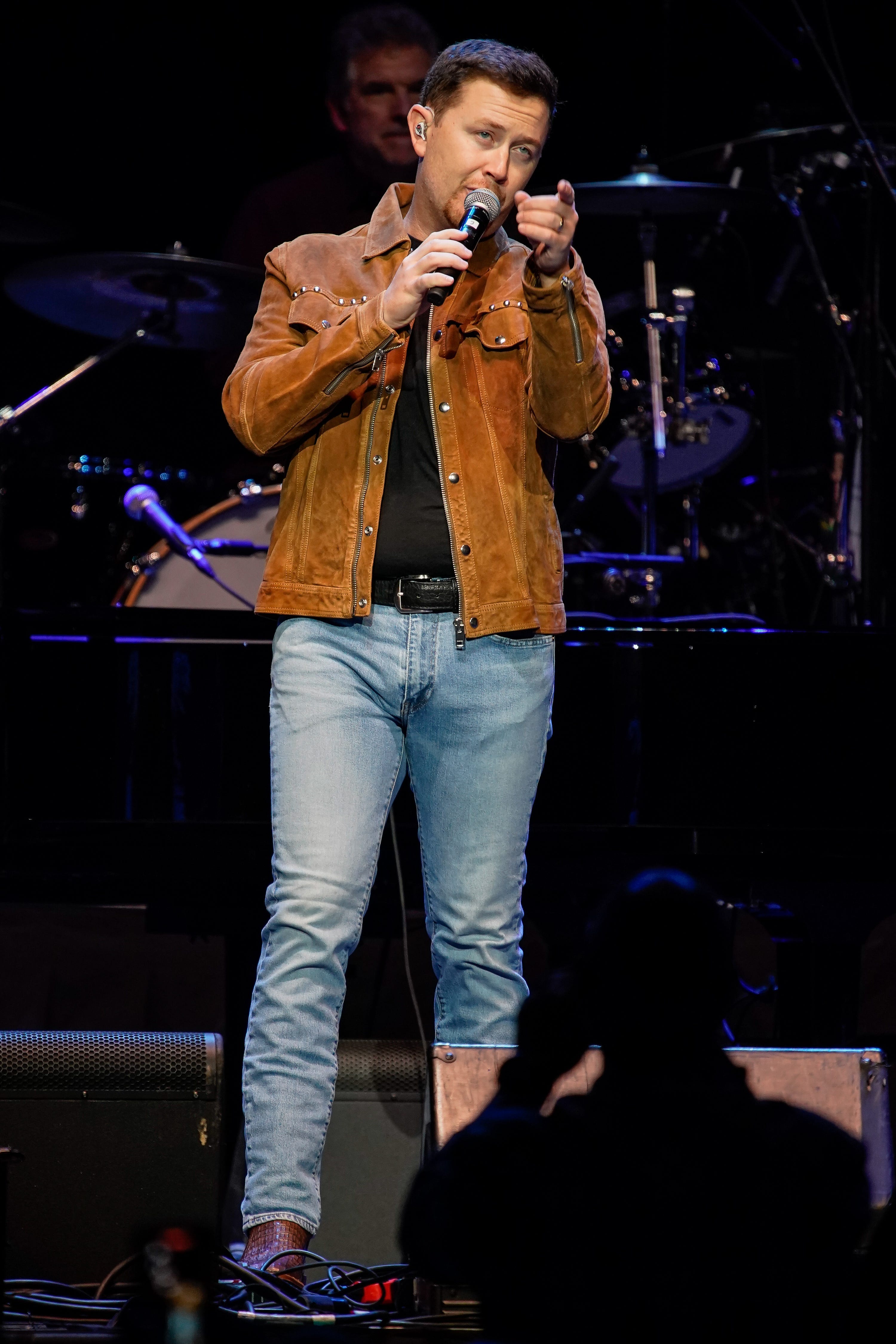 Scotty McCreery performs during the Tribute to Ronnie Milsap concert at Bridgestone Arena in Nashville, Tennessee. McCreery stopped his set at the Colorado State Fair in late August when he saw a man reportedly assaulting a woman in the crowd.