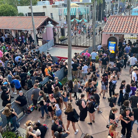 Guests wait to enter Universal Orlando's Halloween Horror Nights.