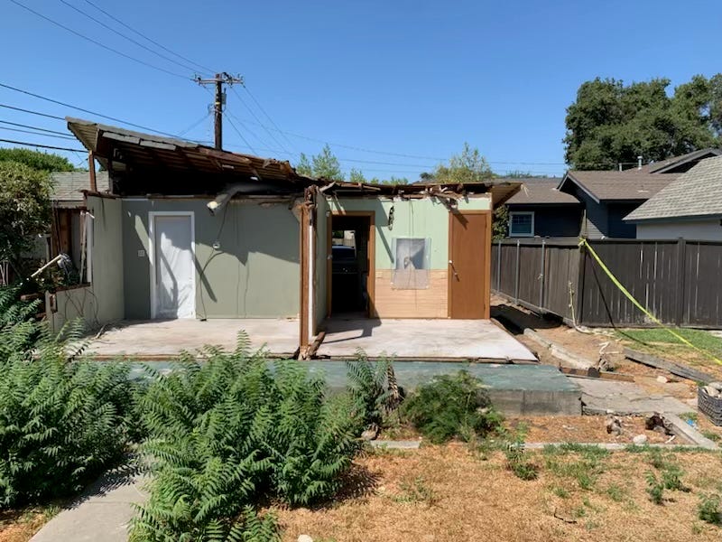 Pictured is a 645 square foot one-bedroom, one-bathroom bungalow in suburban Monrovia, northeast of Los Angeles, California. Half of the home was destroyed by a pine tree in May.
