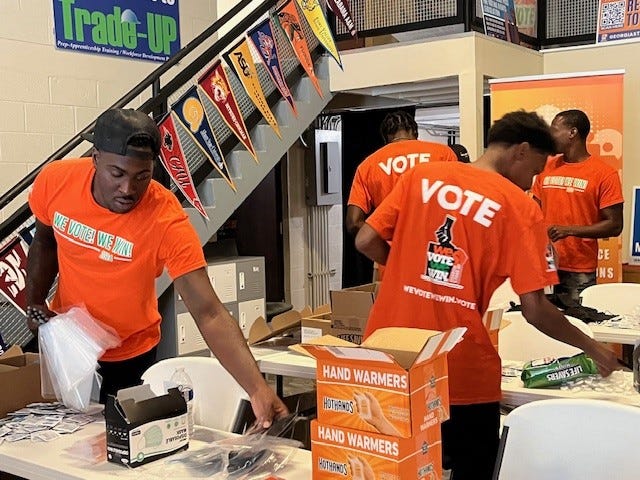 Workers at Georgia STAND-UP packed care packages Aug. 29, 2024 to distribute to voters waiting in line at polling sites next month.