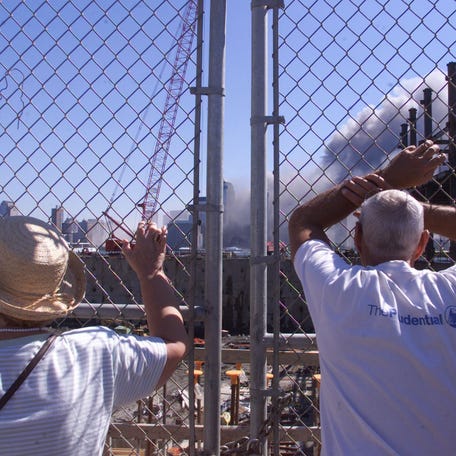 Photos taken on 9/11 of the terrorist attacks that brought down the World Trade Center Twin Towers. Photos taken from Exchange Place in Jersey City, just across the Hudson River from the WTC.