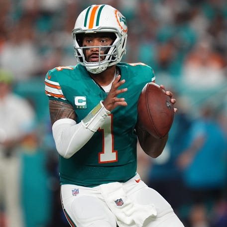 Miami Dolphins quarterback Tua Tagovailoa drops back with the ball against the Buffalo Bills.