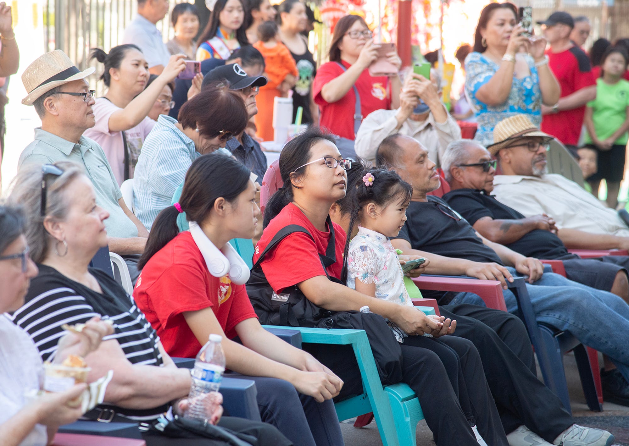 Spectators watch the Mid-Autumn Moon Festival in downtown Stockton, Calif., on Sept. 14, 2024. In a RAND survey of Asian Americans in Los Angeles and New York City, researchers have found that English-speaking respondents, younger (18-24 years old) respondents, and respondents from higher income brackets were more likely to report experiencing an anti-Asian hate incident in 2023 than older, first-generation immigrants.