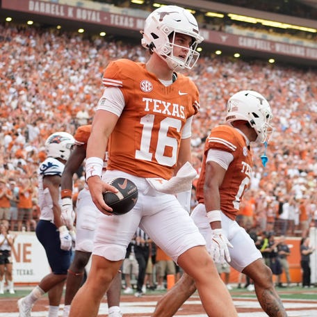 Texas quarterback Arch Manning (16) reacts after scoring a touchdown during the first half against Texas-San Antonio at Darrell K Royal-Texas Memorial Stadium.