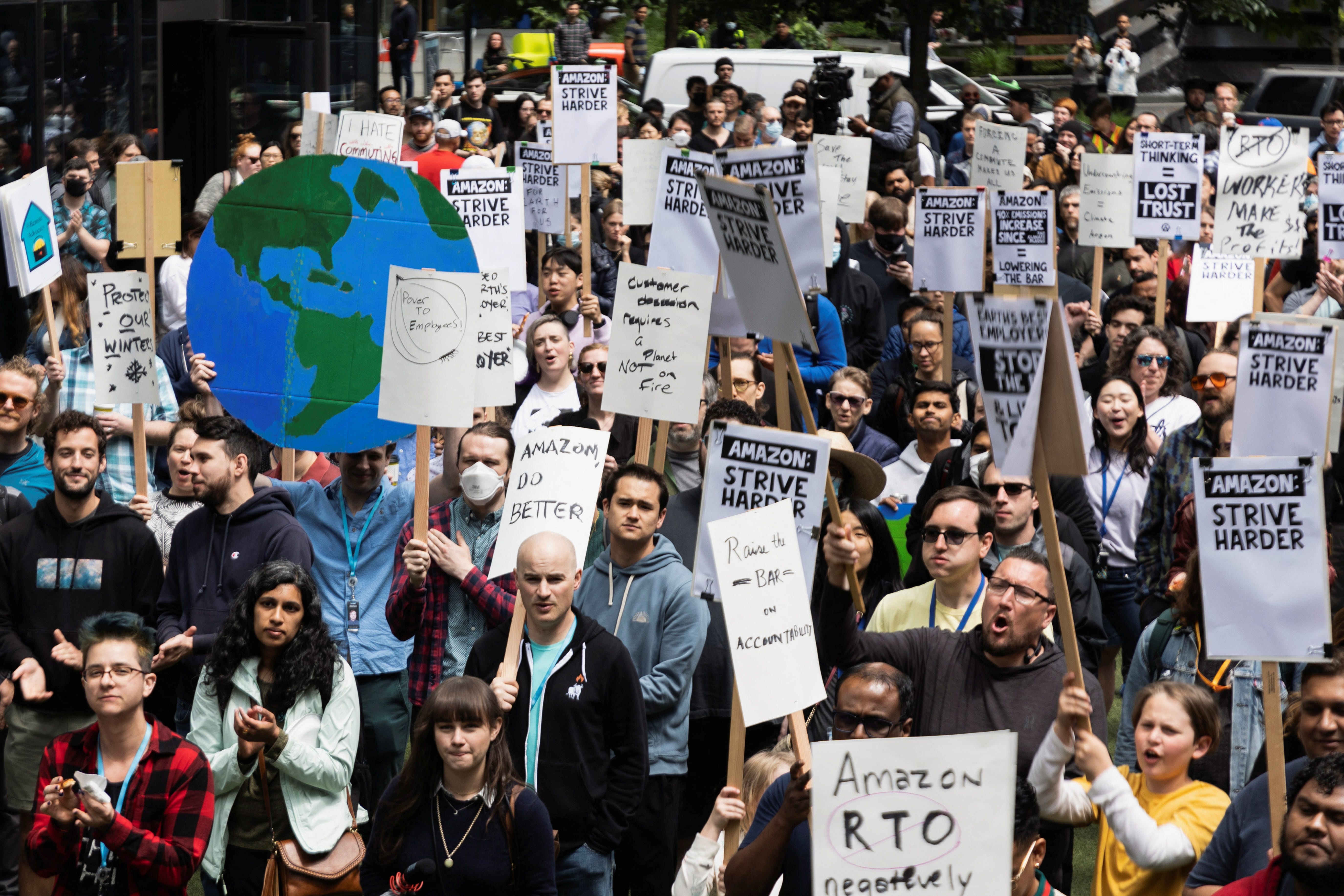 Amazon workers participate in a walkout at Amazon's headquarters in Seattle, Washington on May 31, 2023.