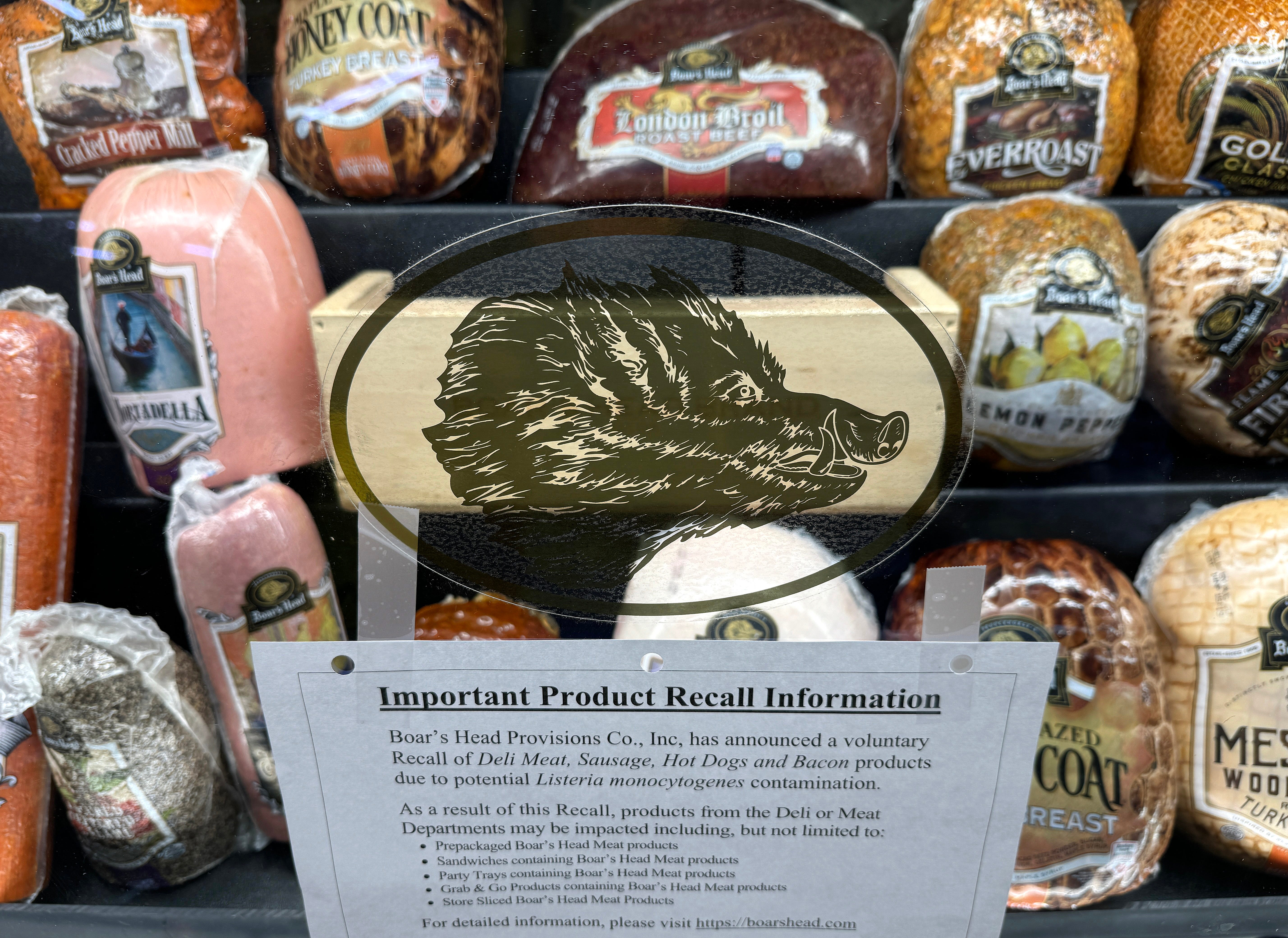 A recall notice placed on a display of Boar's Head meat products at a Safeway store on July 31, 2024.