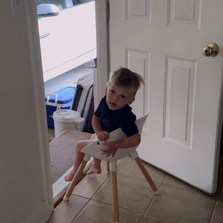 Moriah Nastasi Wilkie found her son Enzo patiently waiting by the door for his dad to return home for work.