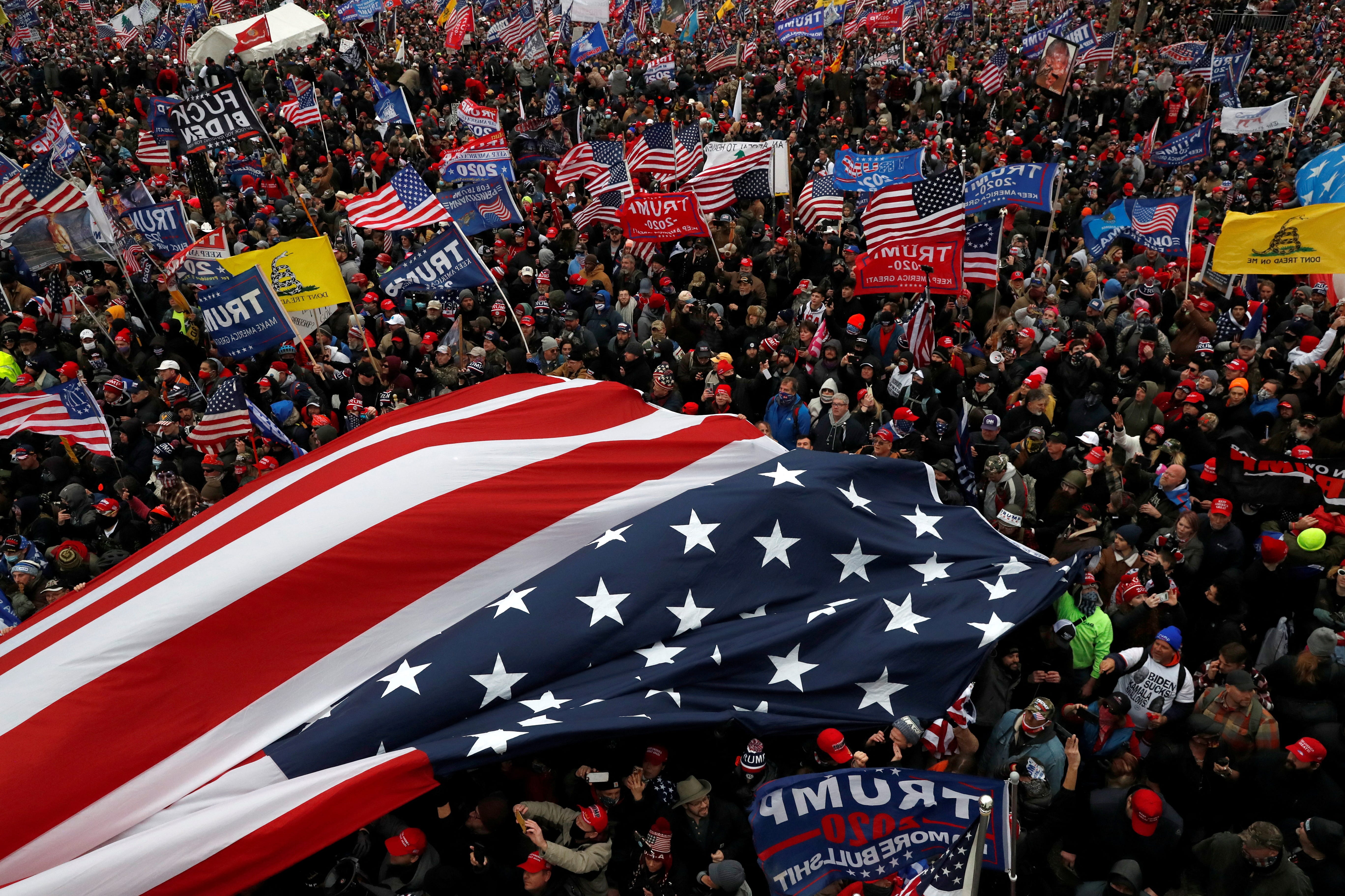 FILE PHOTO: Pro-Trump protesters clash with Capitol police at a rally to contest the certification of the 2020 U.S. presidential election results by the U.S. Congress, at the U.S. Capitol Building in Washington, U.S, January 6, 2021. REUTERS/Shannon Stapleton/File Photo