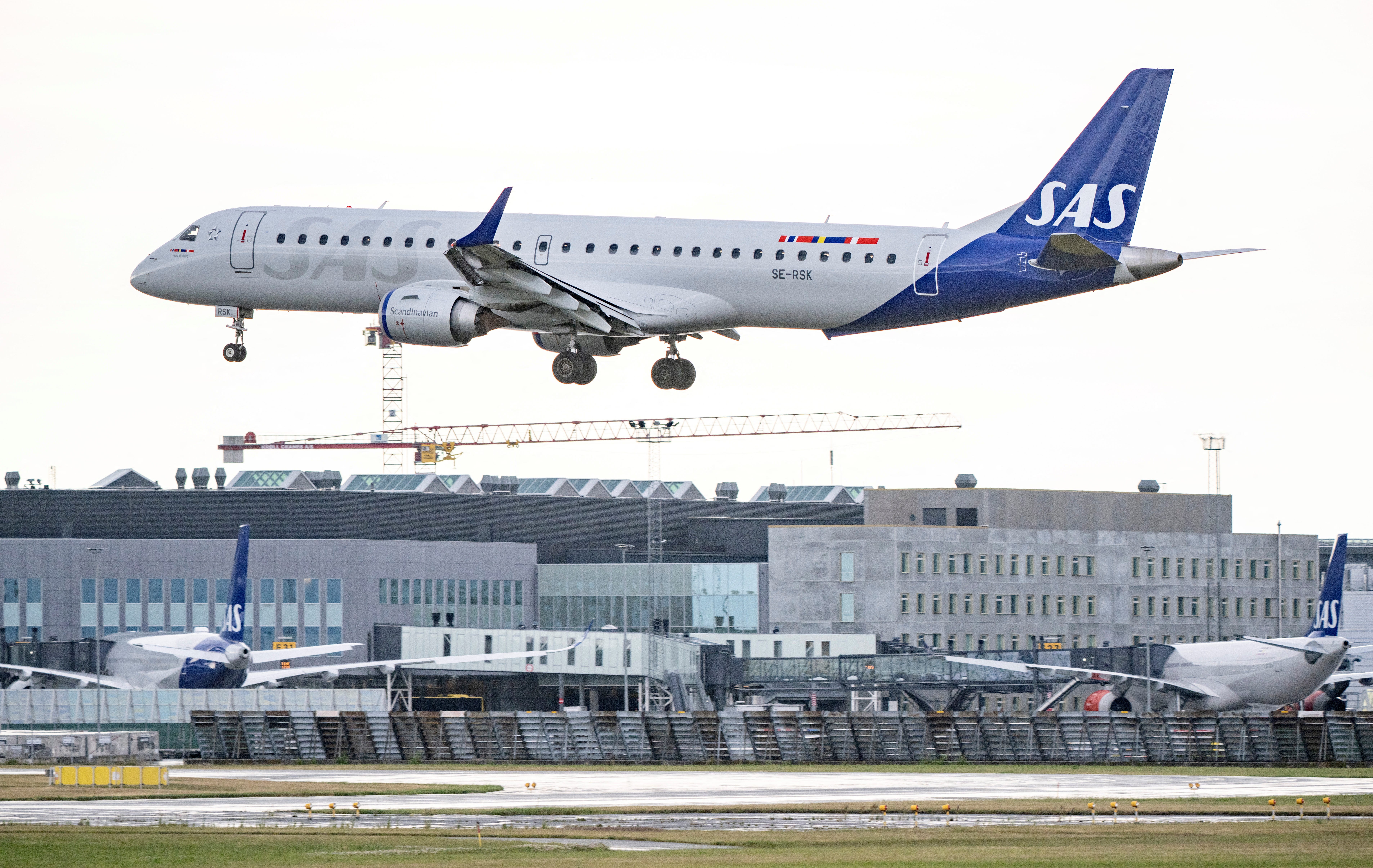SAS Link's Embraer E195 aircraft lands at Kastrup Airport, as pilots of Scandinavian Airlines go on strike, in Kastrup, Denmark July 4, 2022.