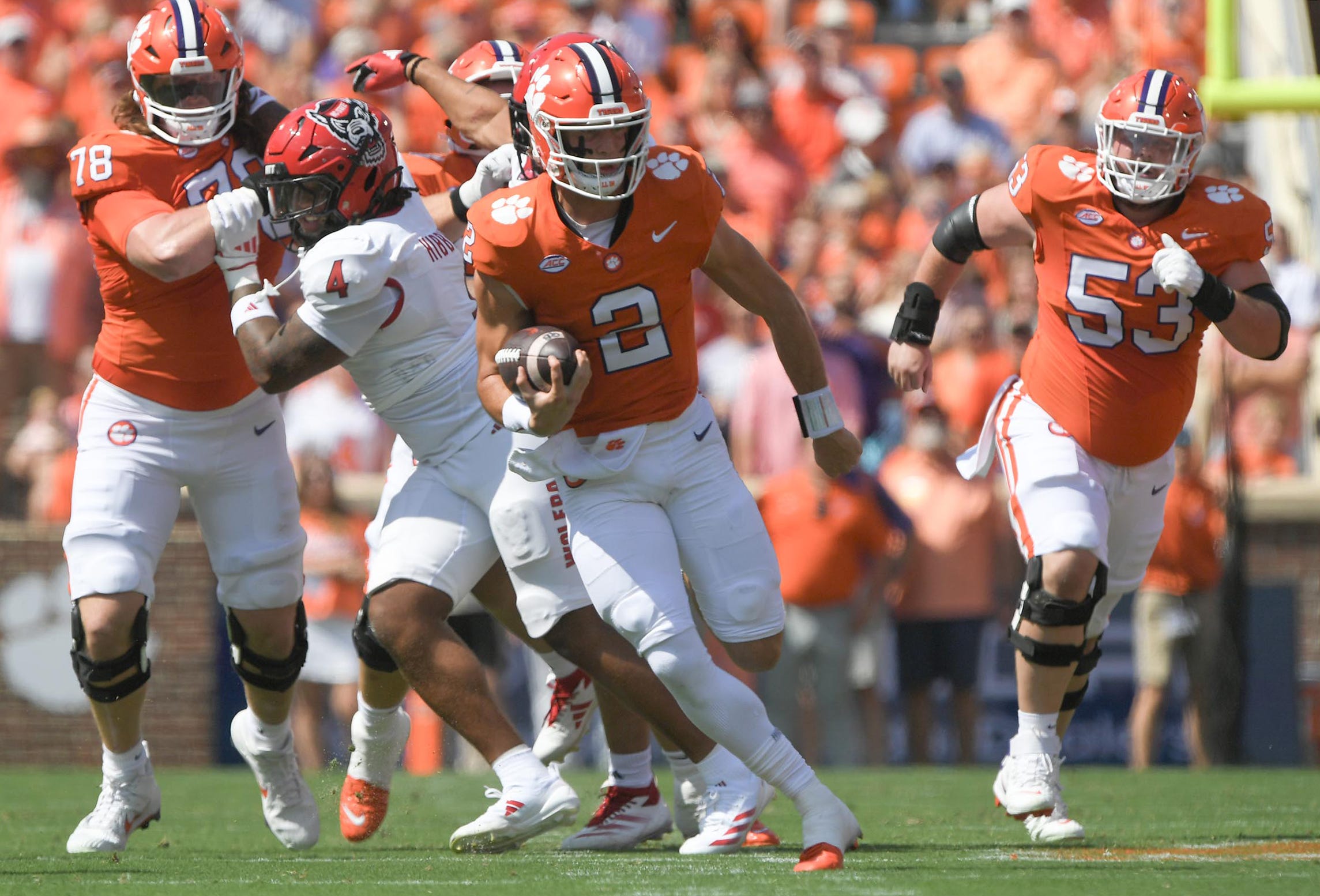 Clemson quarterback Cade Klubnik (2) runs for a touchdown against North Carolina State during the first quarter at Memorial Stadium.