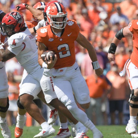 Clemson quarterback Cade Klubnik (2) runs for a touchdown against North Carolina State during the first quarter at Memorial Stadium.