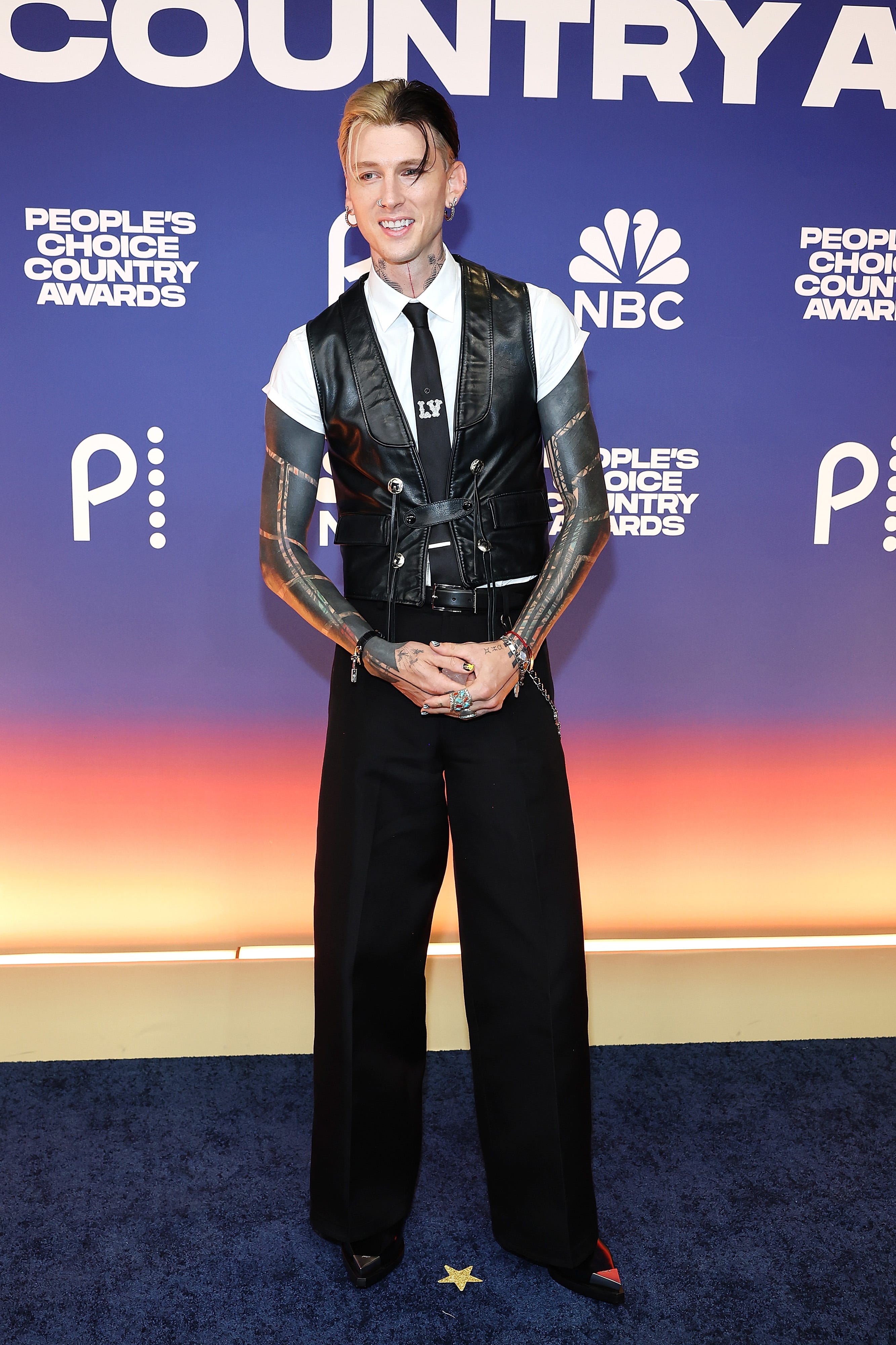 Machine Gun Kelly attends the 2024 People's Choice Country Awards at The Grand Ole Opry on Sept. 26, 2024 in Nashville, Tennessee.