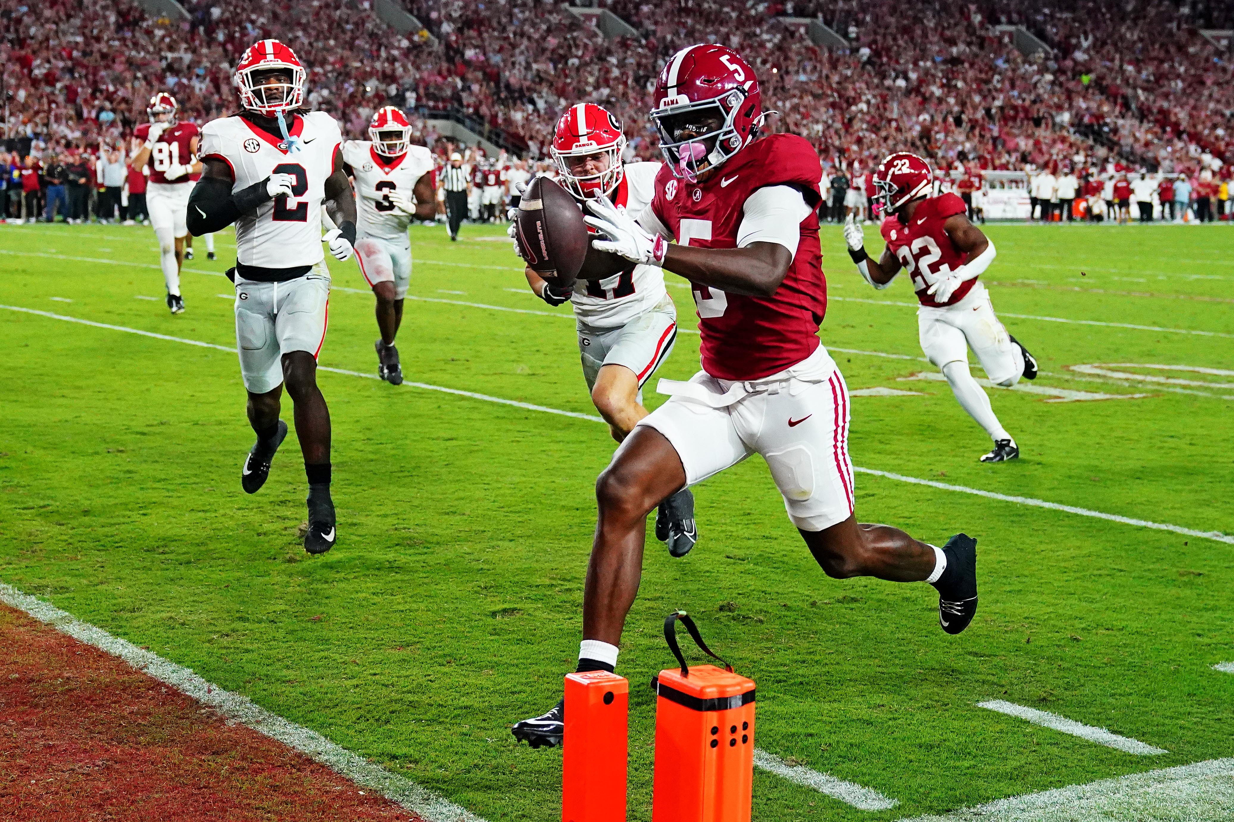 Alabama wide receiver Germie Bernard (5) scores a touchdown during the first quarter against Georgia at Bryant-Denny Stadium.