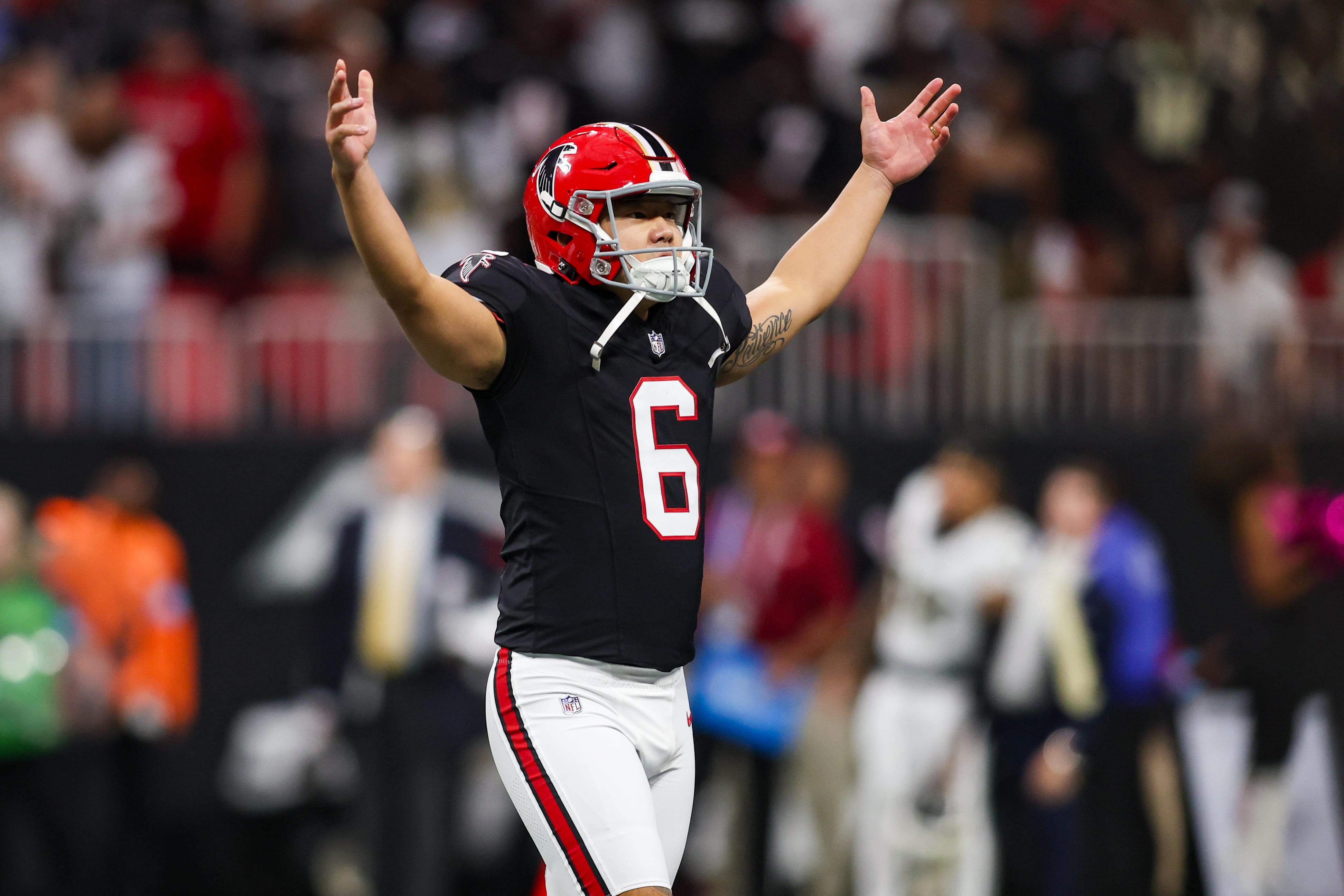 Atlanta Falcons place kicker Younghoe Koo (6) celebrates after kicking the game-winning field goal against the New Orleans Saints in the fourth quarter at Mercedes-Benz Stadium.