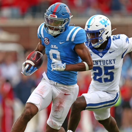 Mississippi wide receiver Tre Harris (9) runs after a catch against Kentucky during the second half at Vaught-Hemingway Stadium.