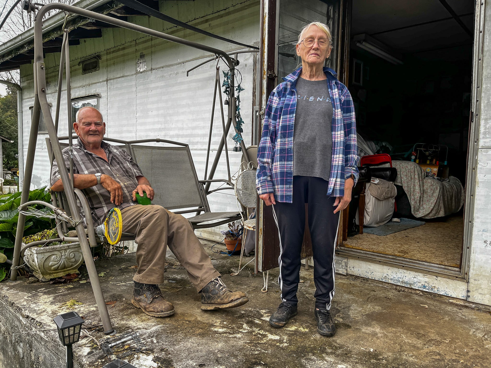 Carolyn and Clifford Coffee at their home in Meat Camp, North Carolina. Officials say homes set between steep Appalachian hillsides and along creeks, which make them vulnerable to landslides and flooding, also pose challenges for recovery and rebuilding.