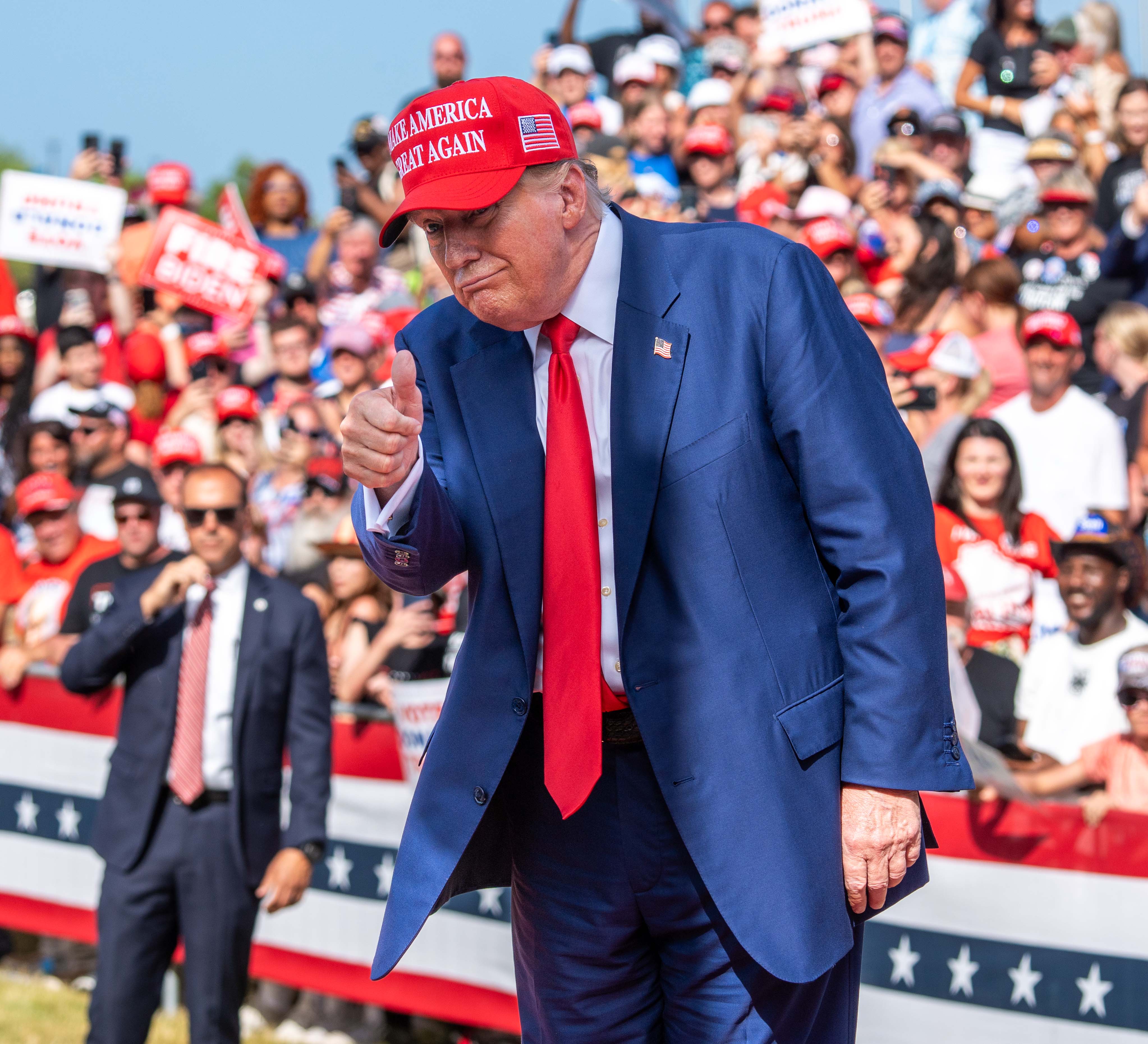 Former President Donald Trump departs after making remarks at a rally at the Racine Festival Park in Racine.
