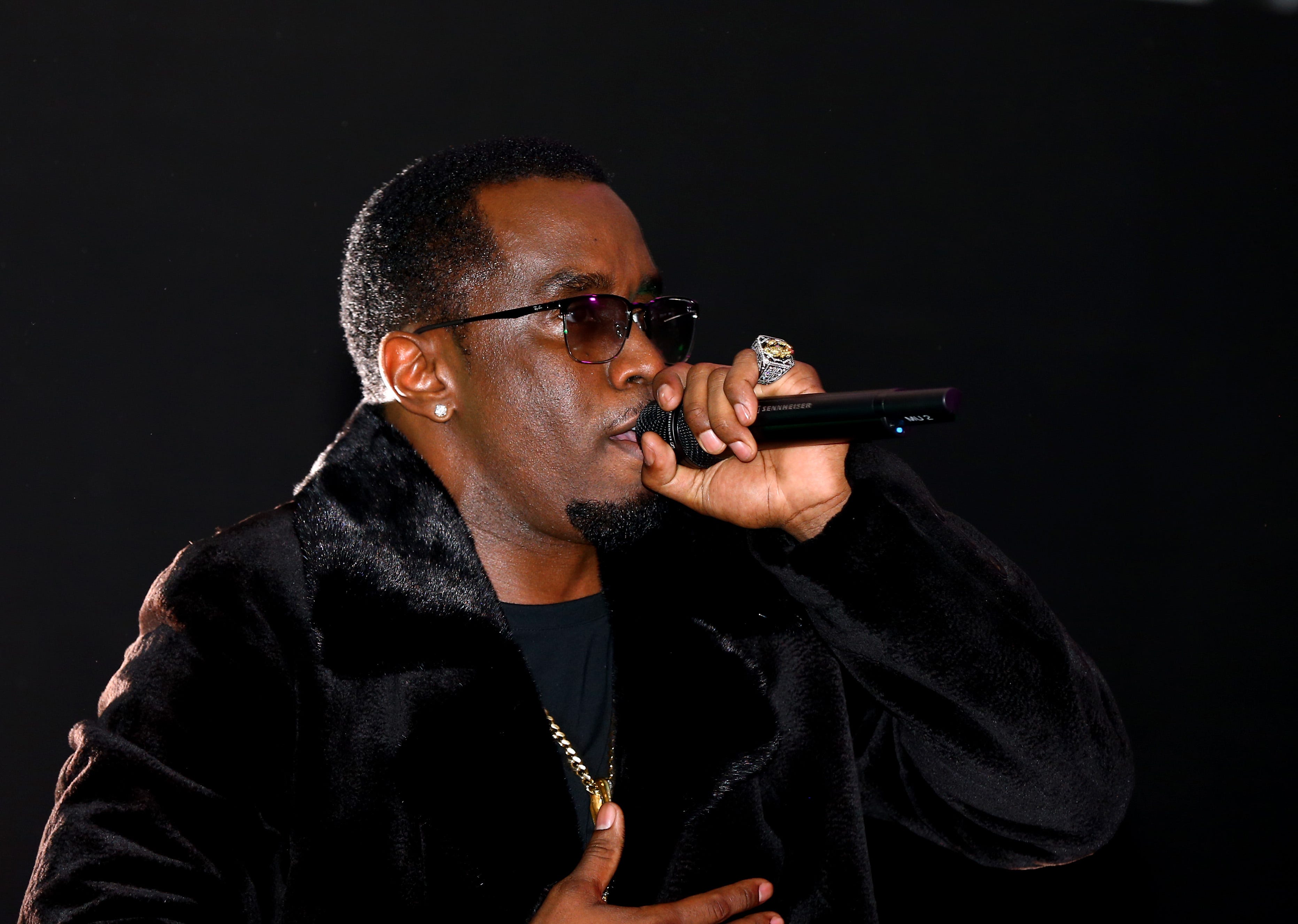 Feb 1, 2014; New York, NY, USA; Recording artist/rapper Sean Combs aka Diddy performs during the Revolt Party at the Time Warner Cable Studios. Mandatory Credit: Mark J. Rebilas-USA TODAY Sports