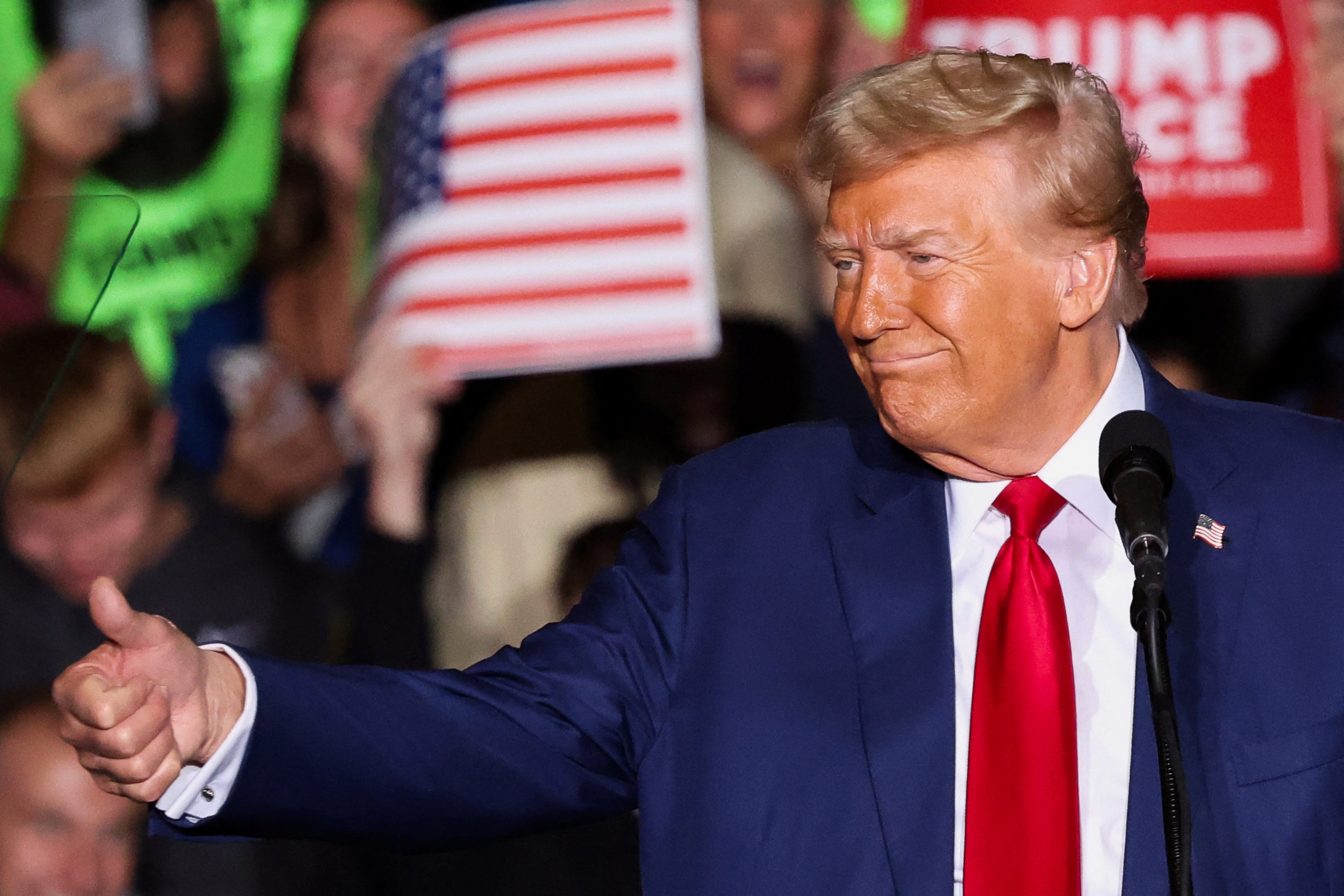 Republican presidential nominee Donald Trump campaigns in Saginaw, Mich., on Oct. 3, 2024.