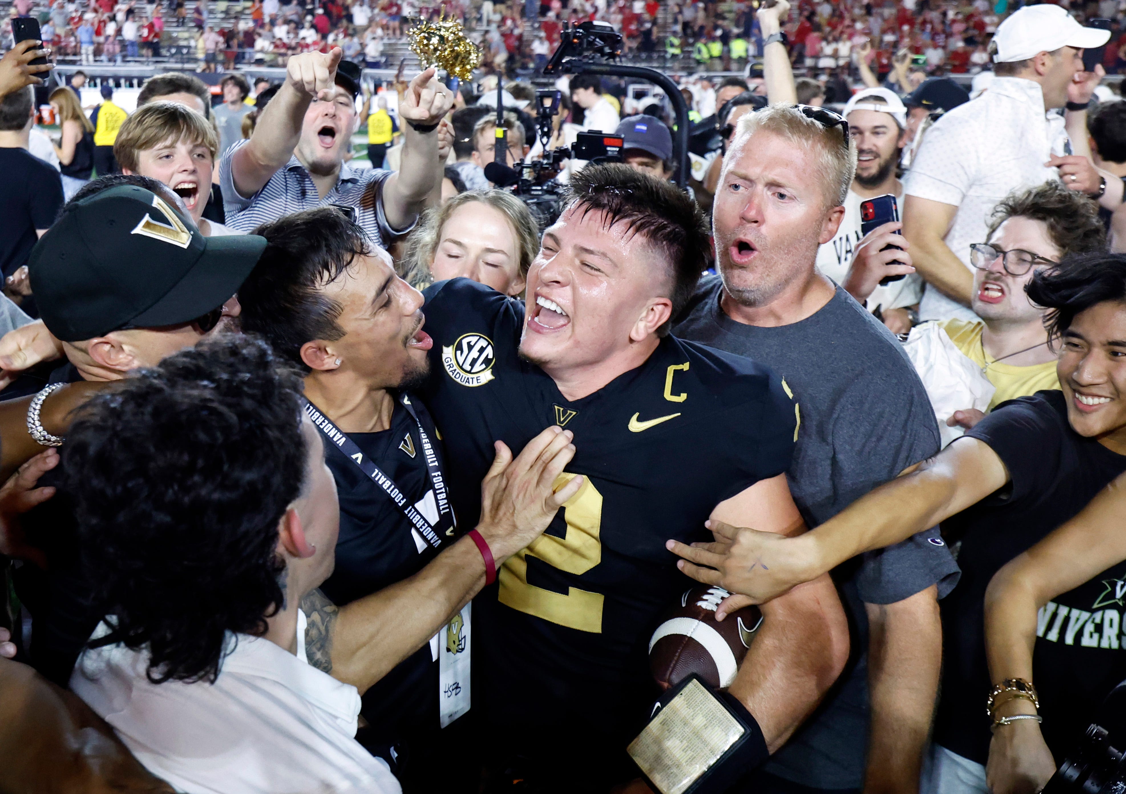 Vanderbilt quarterback Diego Pavia celebrates with fans after the Commodores defeated Alabama at FirstBank Stadium.