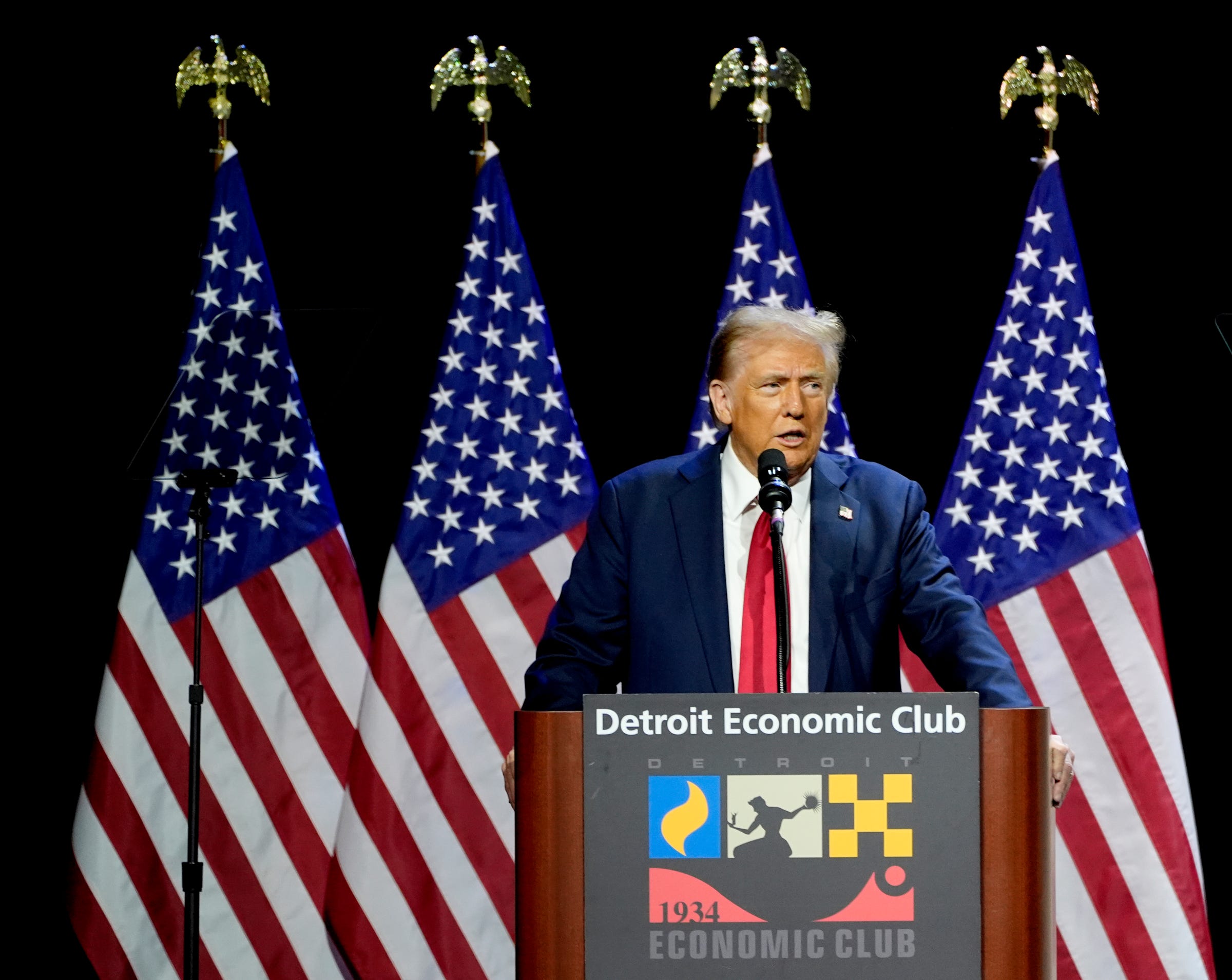 Former President Donald Trump talks to the Detroit Economic Club crowd at MotorCity Casino Soundboard in Detroit on Thursday, Oct. 10, 2024.