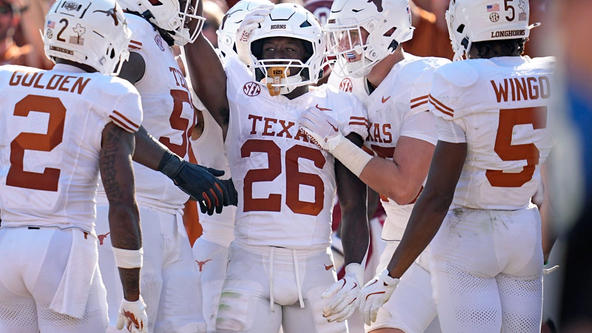 Texas running back Quintrevion Wisner (26) celebrates a touchdown in the first half against Oklahoma at the Cotton Bowl Stadium in Dallas, Texas, Saturday, Oct., 12, 2024.