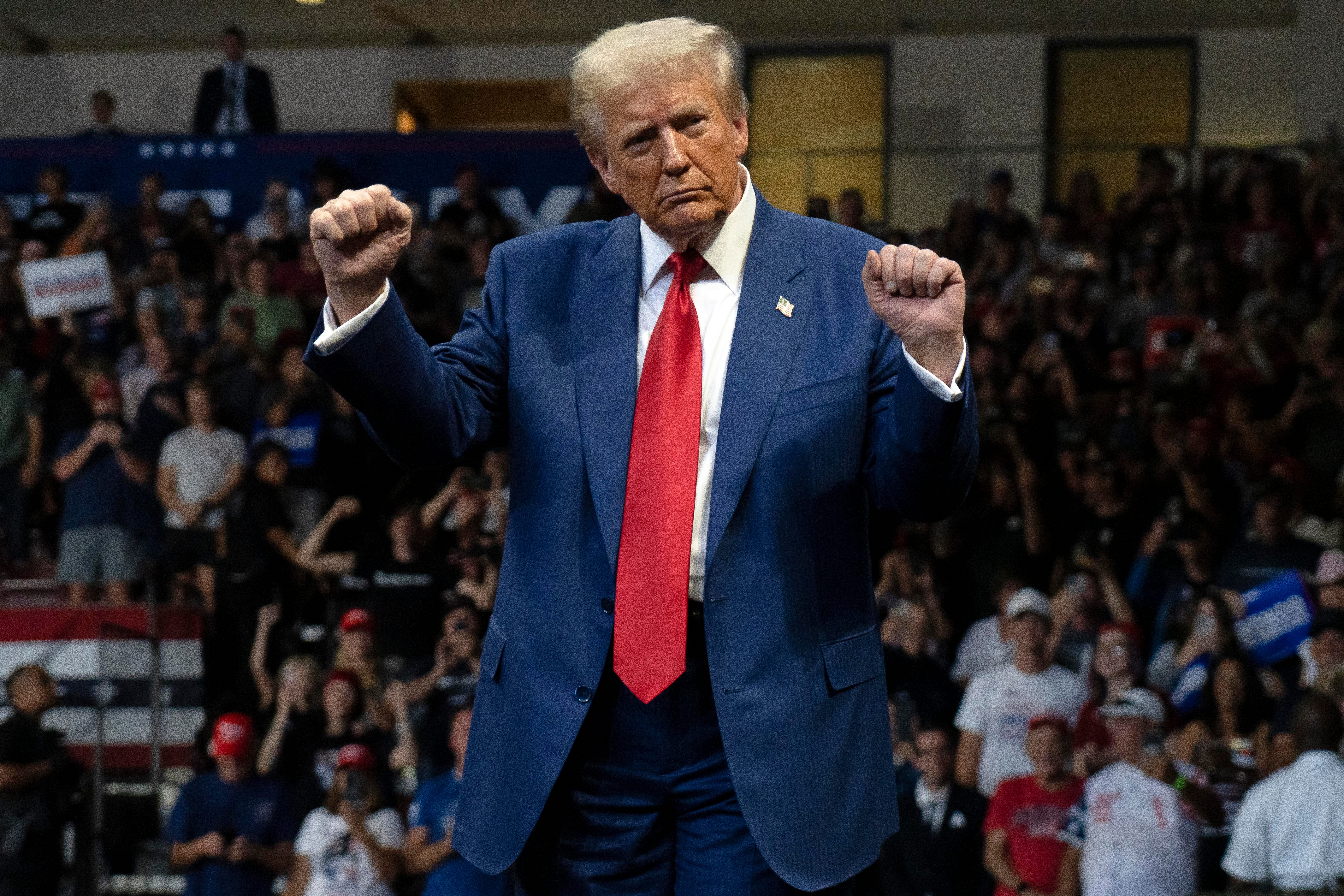 U.S. Republican presidential nominee, former President Donald Trump dances during a campaign rally at Findlay Toyota Center on October 13, 2024 in Prescott Valley, Arizona.