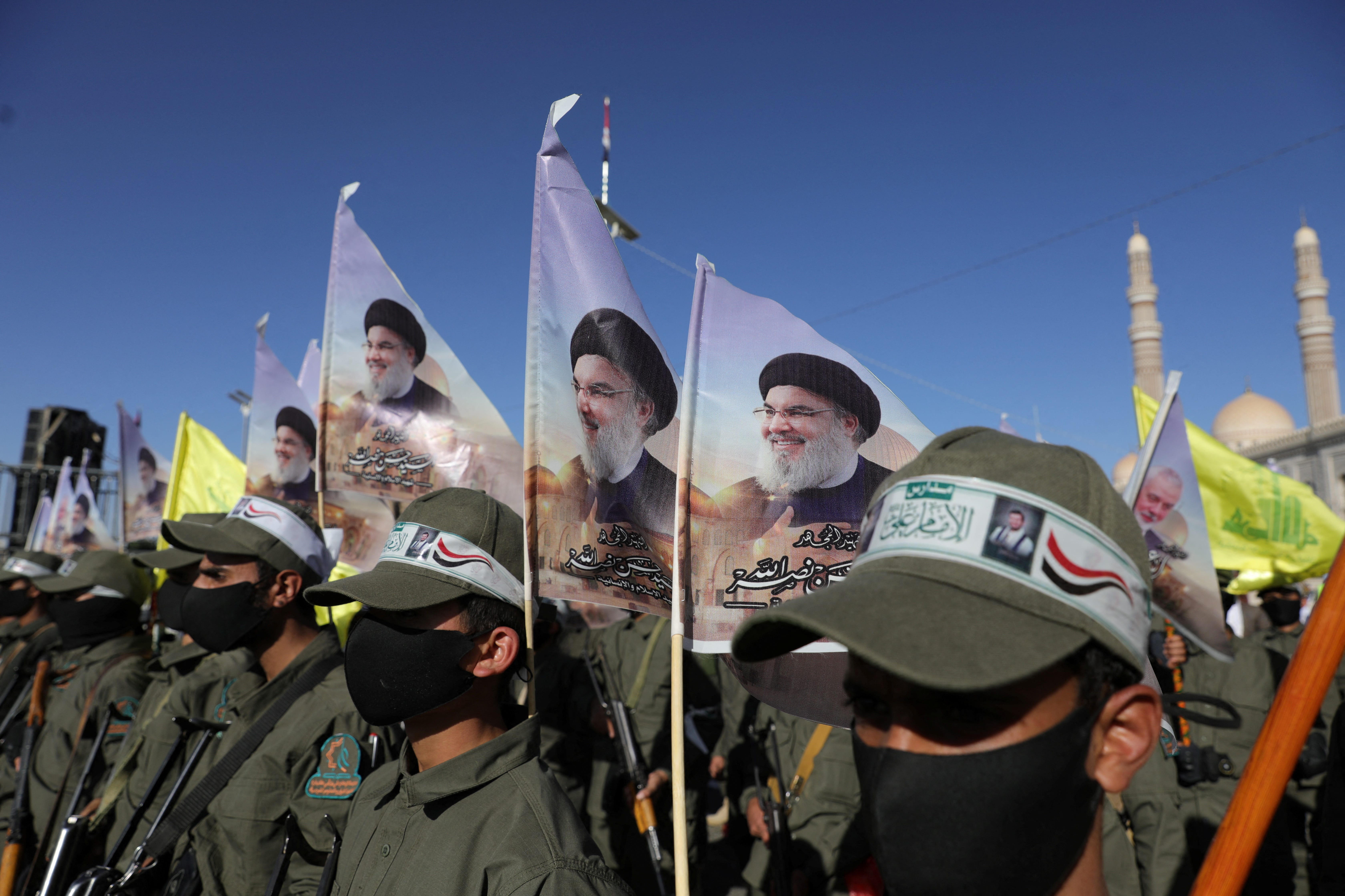 Newly recruited Houthi fighters stand during a rally to commemorate the late leader of Lebanon's Hezbollah, Hassan Nasrallah, and to show support to Palestinians in the Gaza Strip, in Sanaa, Yemen, on Oct. 4, 2024.