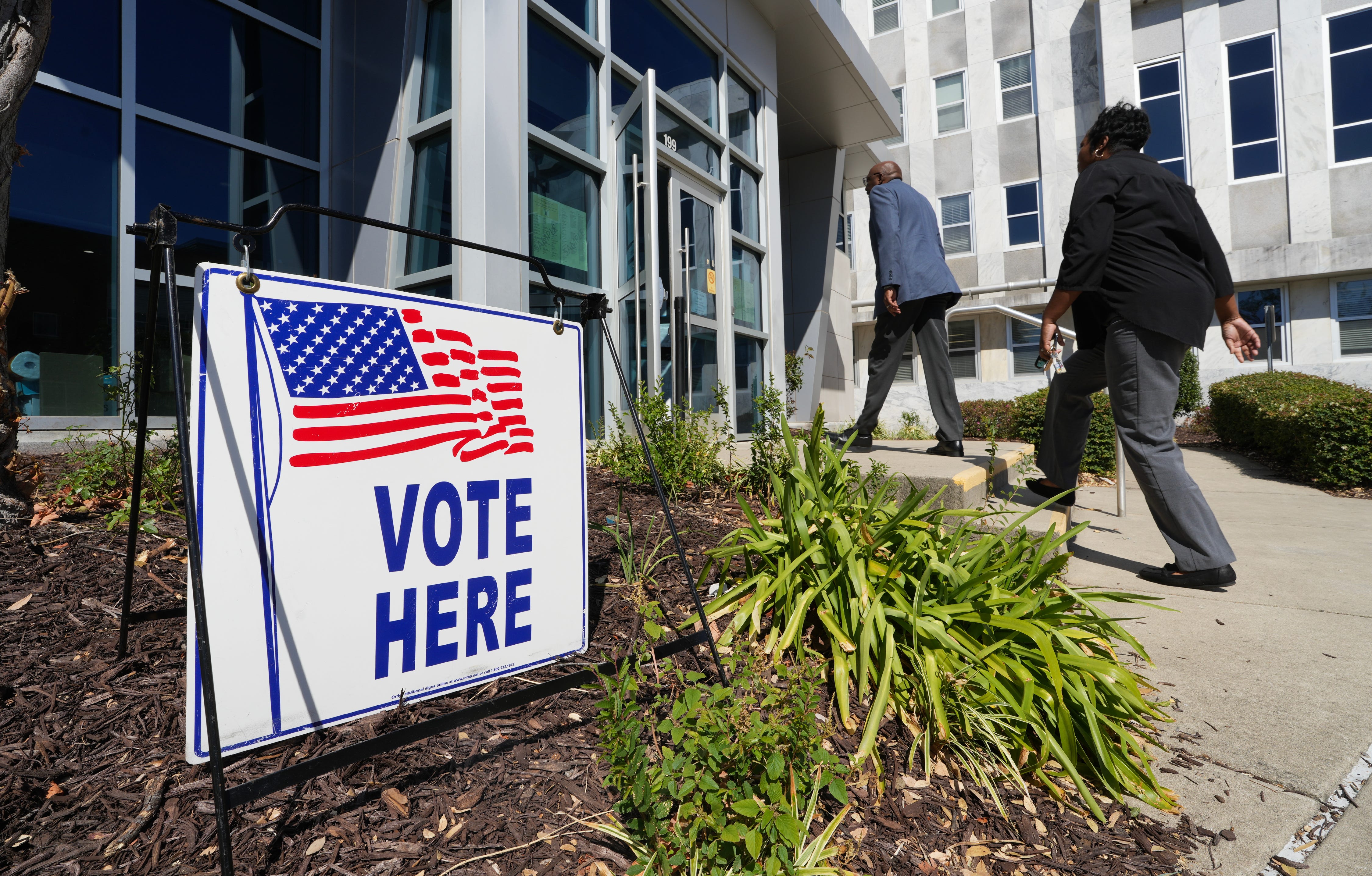 Voters entered the Augusta-Richmond County Municipal Building to cast their ballots during the early voting period in Augusta, Ga. on Oct. 18, 2024.