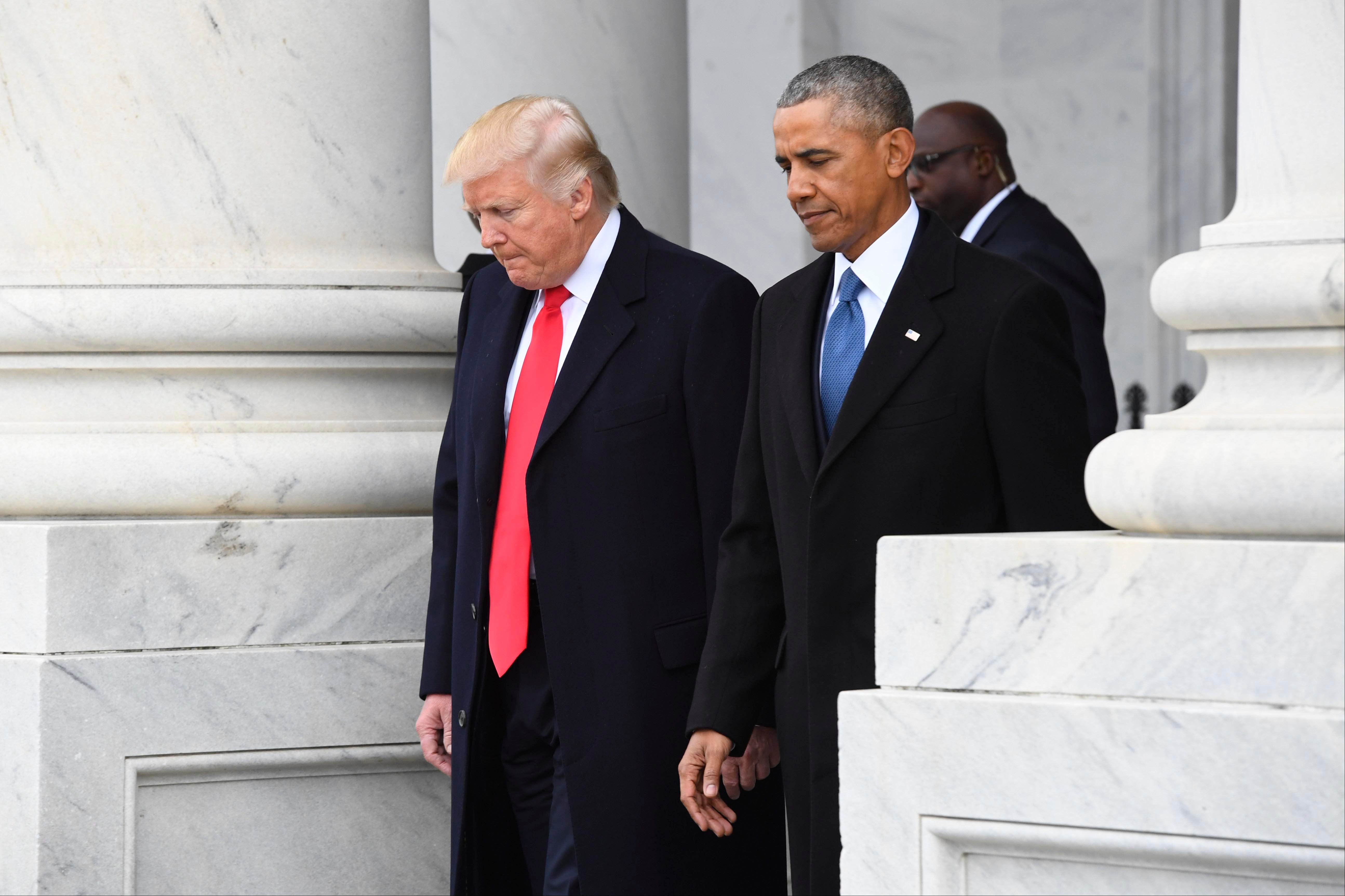Jan 20, 2017; Washington, DC, USA; President Donald Trump and former President Barack Obama walk out of the East front prior to Obama's departure from the 2017 Presidential Inauguration at the U.S. Capitol. Mandatory Credit: Jack Gruber-USA TODAY NETWORK