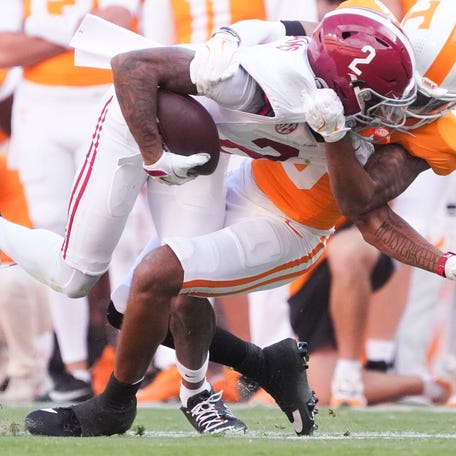 Tennessee defensive back Jalen McMurray (6) pulls down Alabama wide receiver Ryan Williams (2) during their game at Neyland Stadium on Saturday, Oct. 19, 2024, in Knoxville. Tenn.