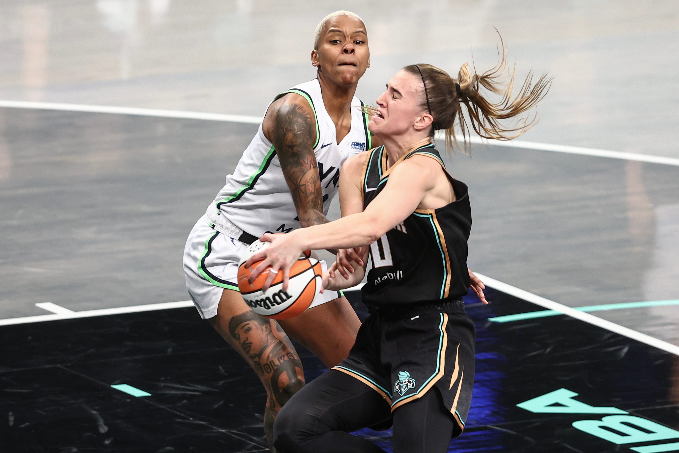 New York Liberty guard Sabrina Ionescu (20) looks to drive past Minnesota Lynx guard Courtney Williams (10) during Game 5 of the WNBA Finals on Oct. 20, 2024.