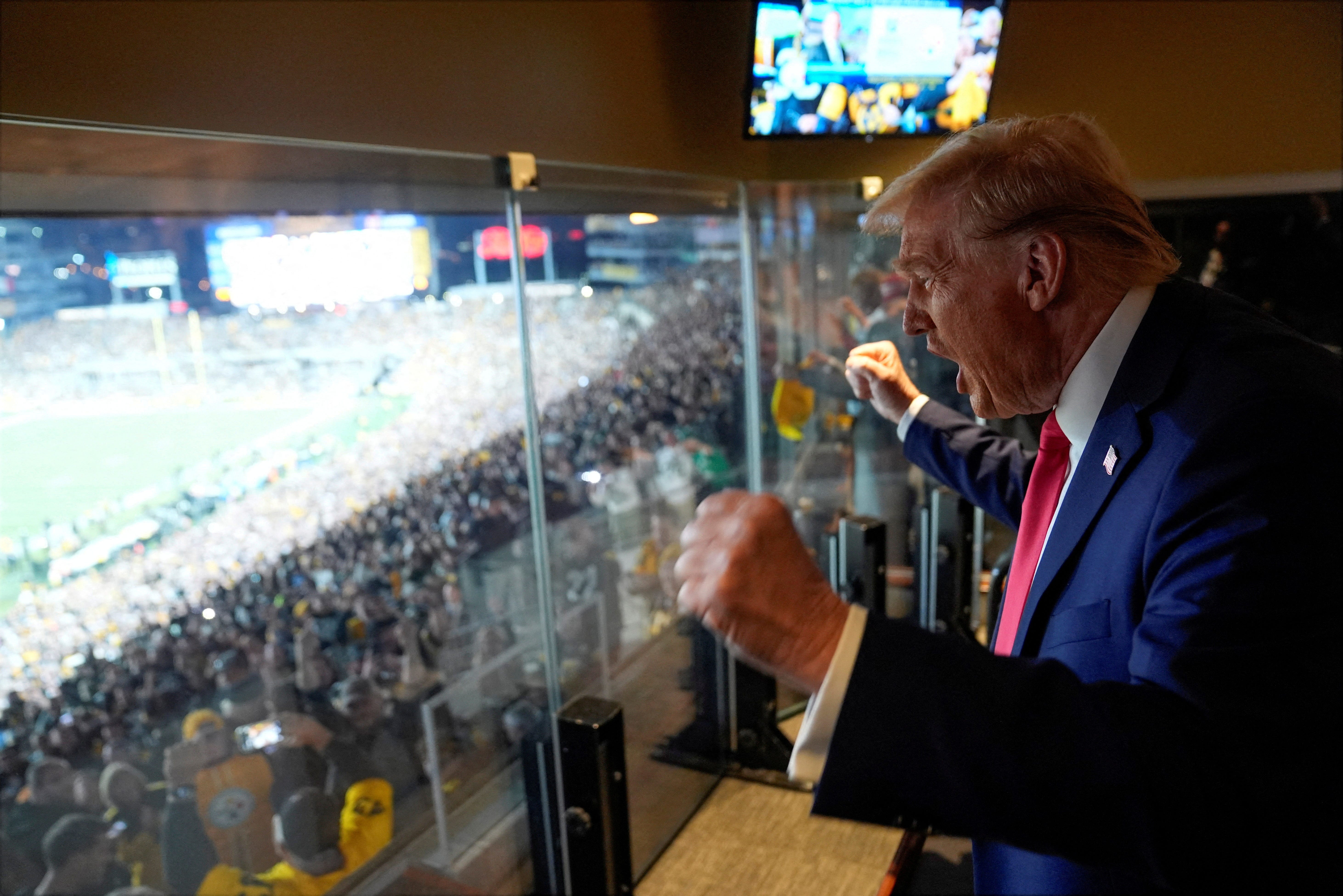 Republican presidential nominee, former U.S. President Donald Trump attends the New York Jets football game against the Pittsburgh Steelers at Acrisure Stadium, Sunday, Oct. 20, 2024, in Pittsburgh.