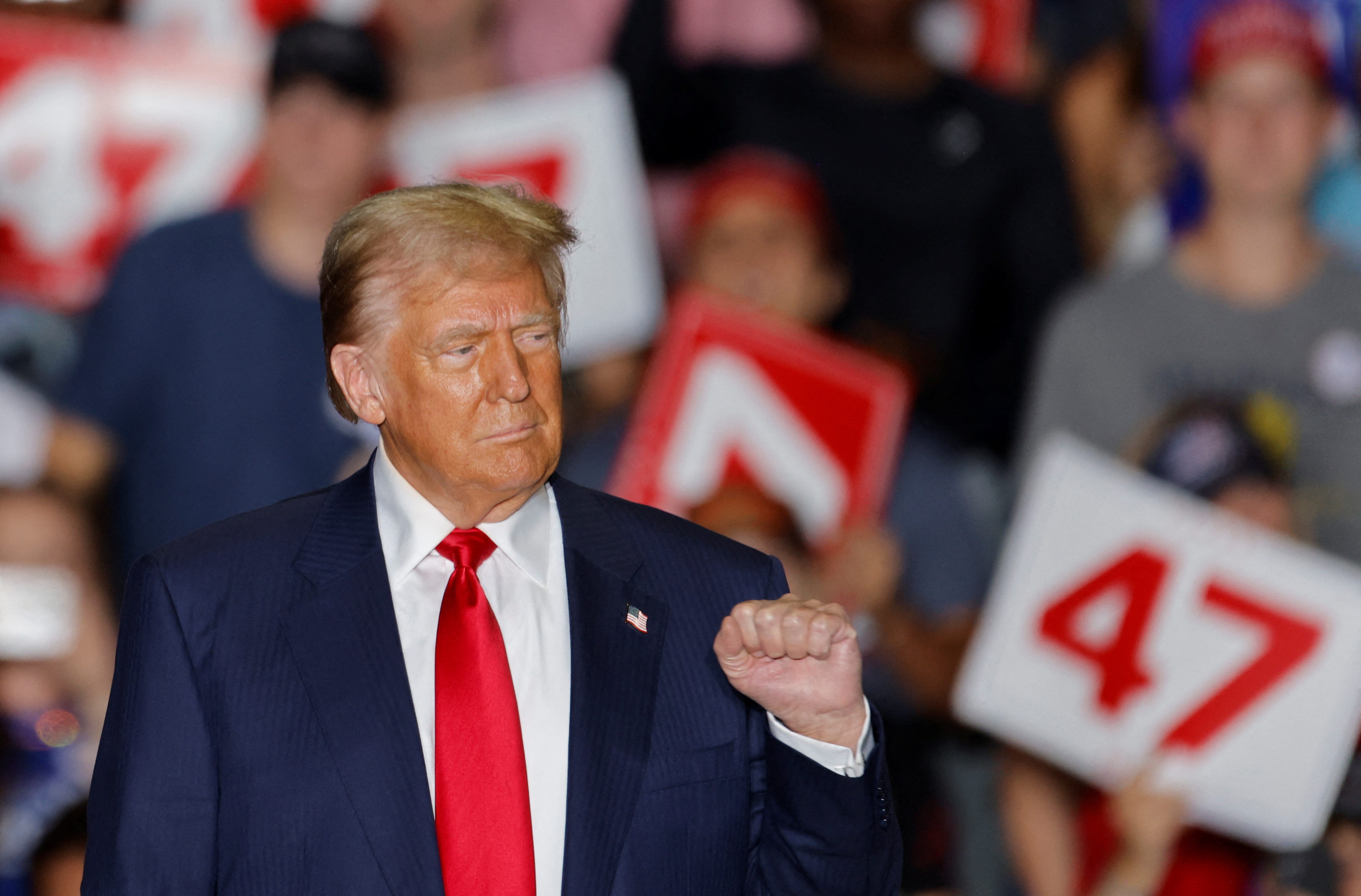 Republican presidential nominee former U.S. President Donald Trump gestures during a rally in Greensboro Coliseum, in Greensboro, North Carolina, U.S. October 22, 2024.