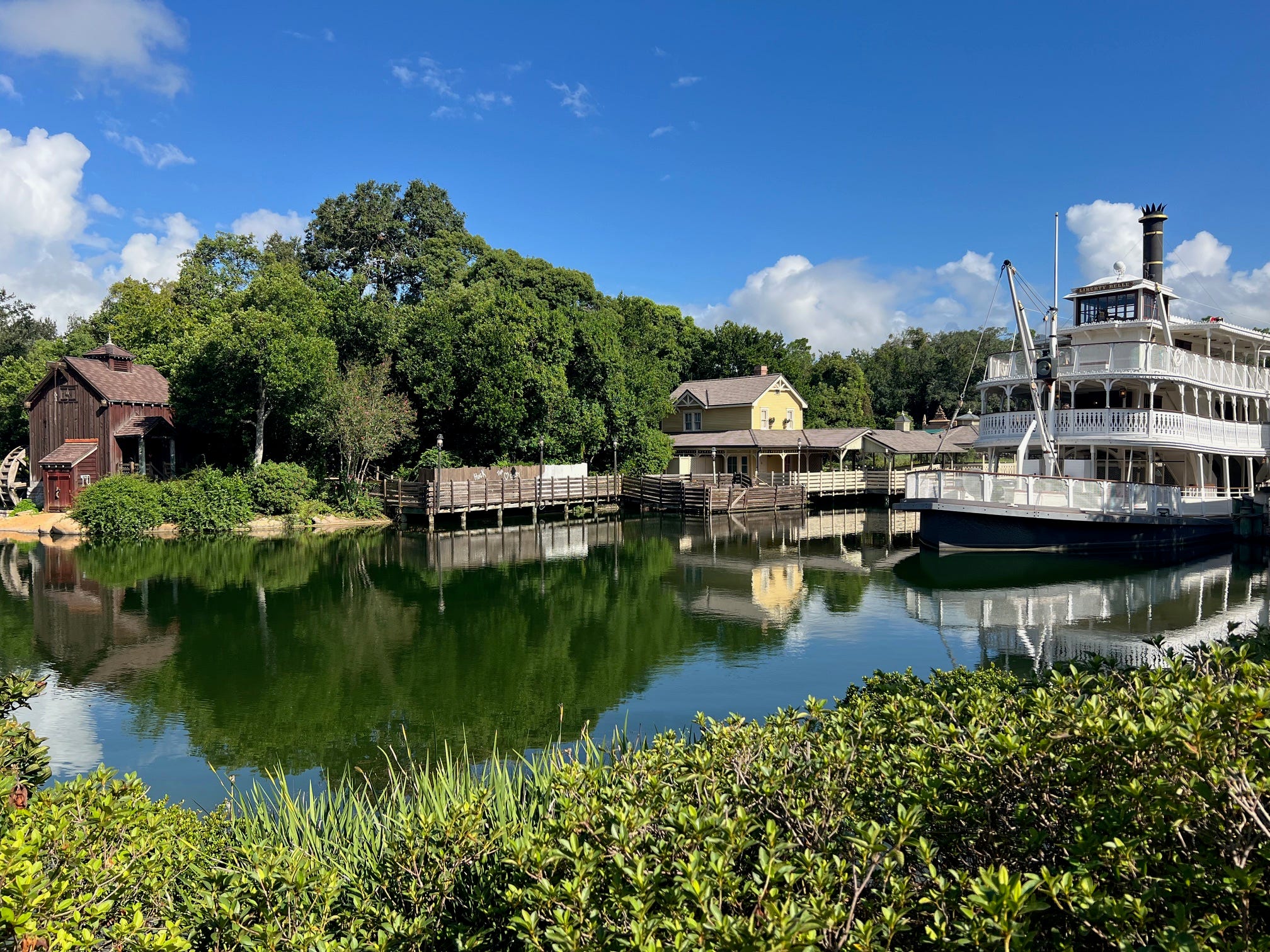 Liberty Square Riverboat takes guests along Rivers of America. A seperate raft transports guests to Tom Sawyer Island.