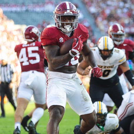 Alabama running back Jam Miller (26) scores a touchdown against Missouri during the second quarter at Bryant-Denny Stadium.
