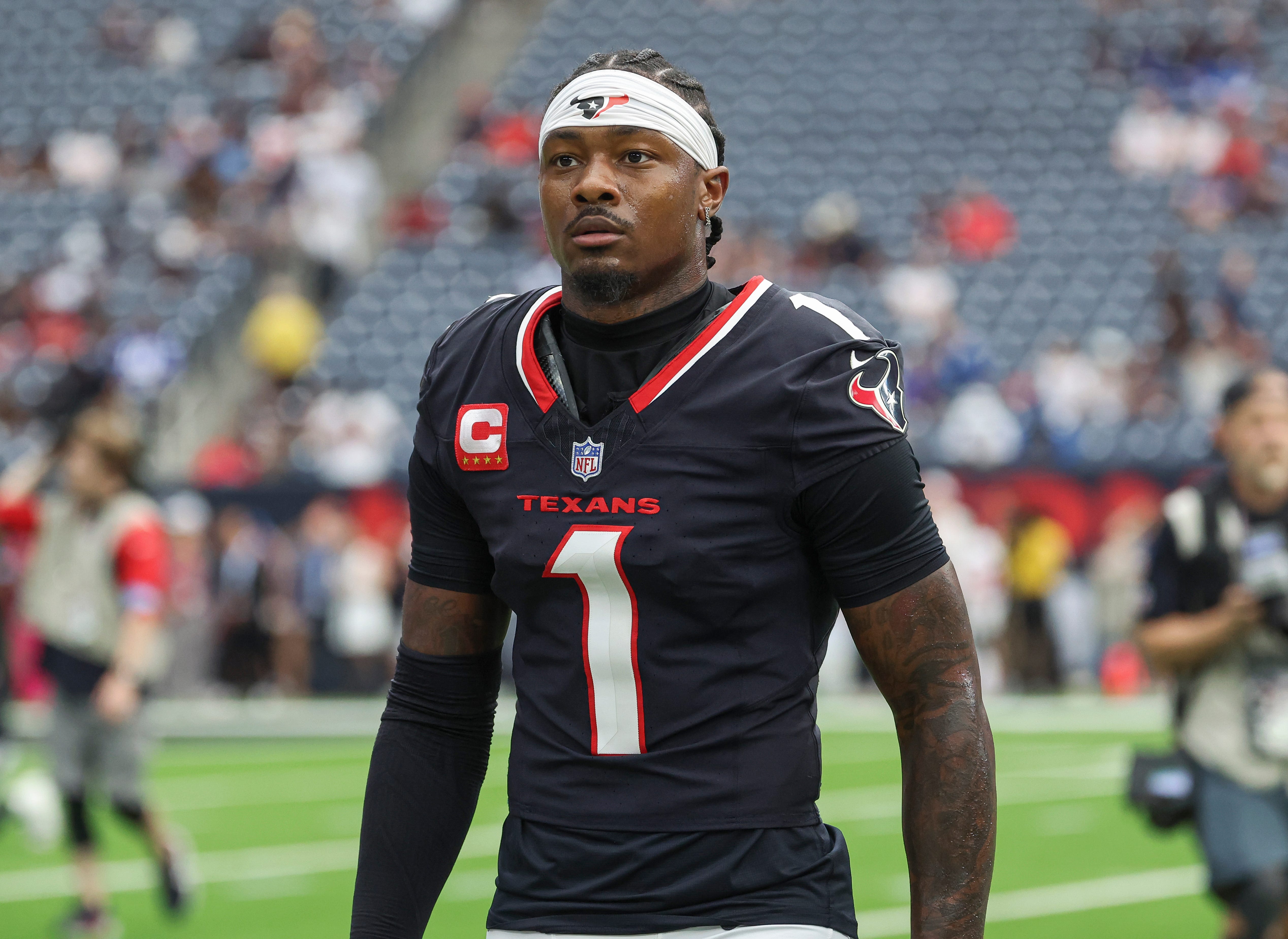 Houston Texans wide receiver Stefon Diggs (1) walks towards the sideline before the game against the Indianapolis Colts at NRG Stadium in Houston on Oct 27, 2024.