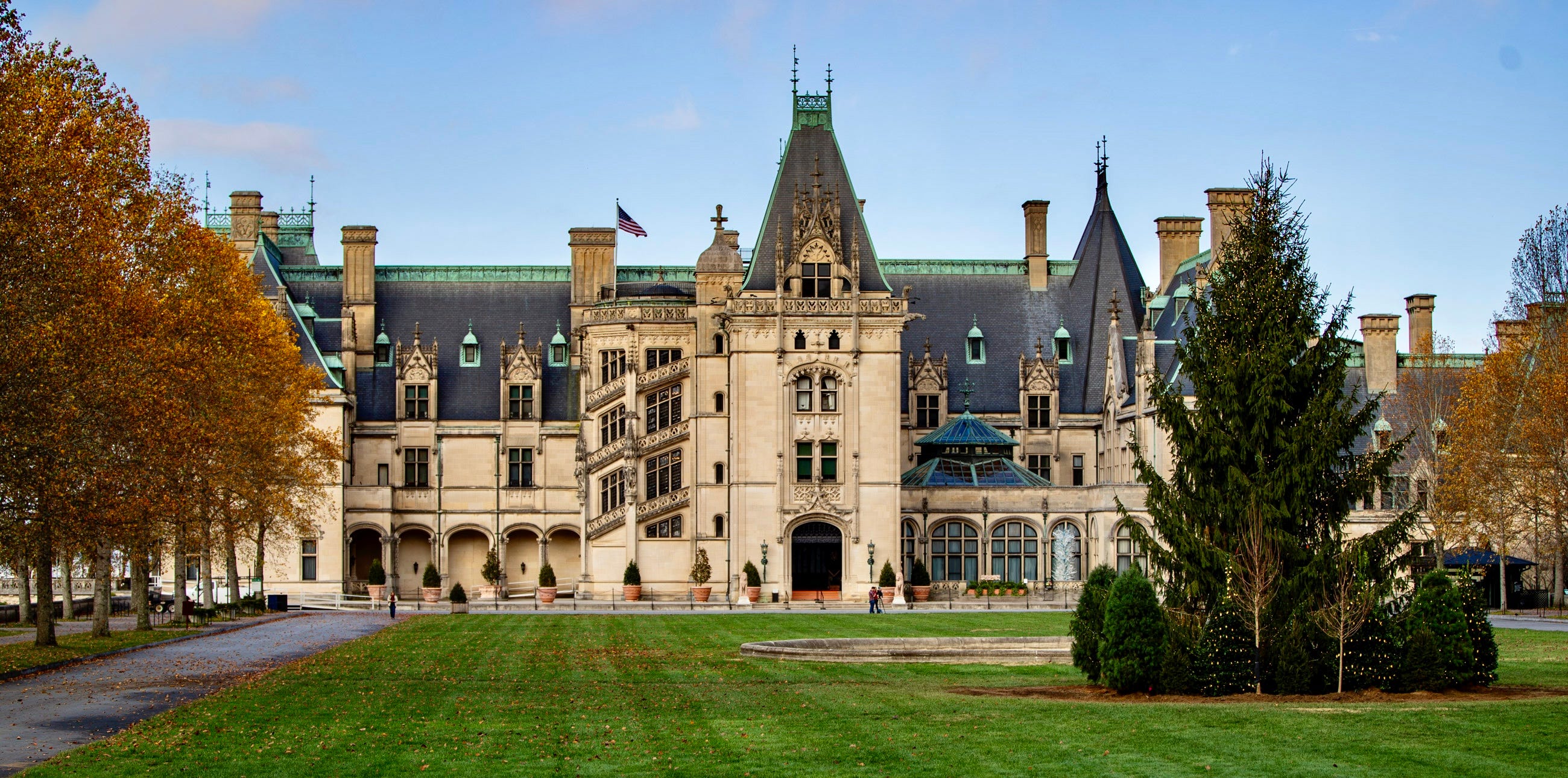 A Christmas tree stands in front of the Biltmore House Wednesday morning, Oct. 30, 2024, on the day of the the Biltmore House Christmas Tree Raising at the Biltmore Estate in Asheville. The tree, a 28-foot Fraser Fir, was supplied by Andrews Nursery in Newland, NC.