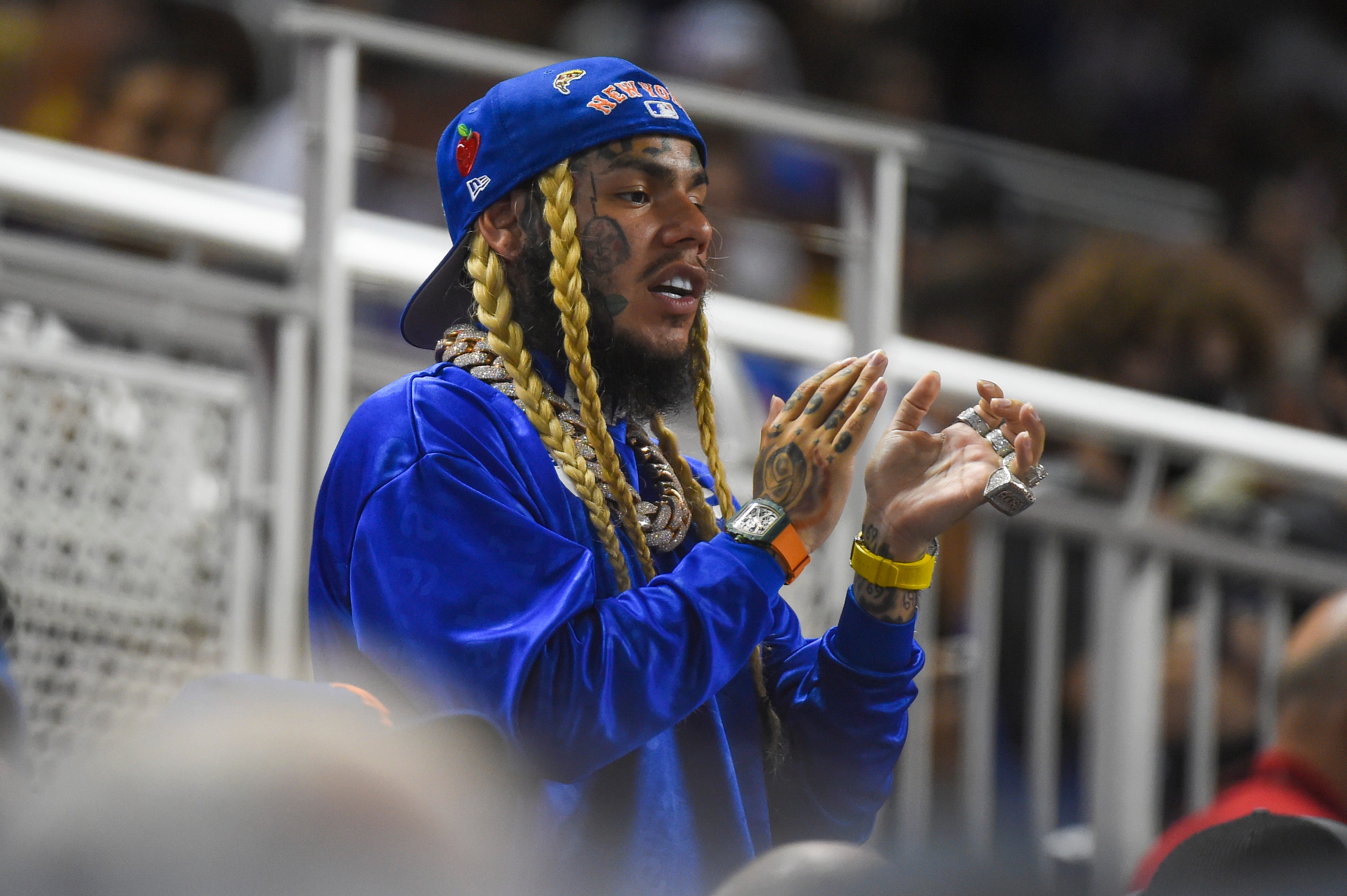 Tekashi 6ix9ine cheers on the New York Mets during the game against the Miami Marlins at LoanDepot Park on Aug. 3, 2021, in Miami.