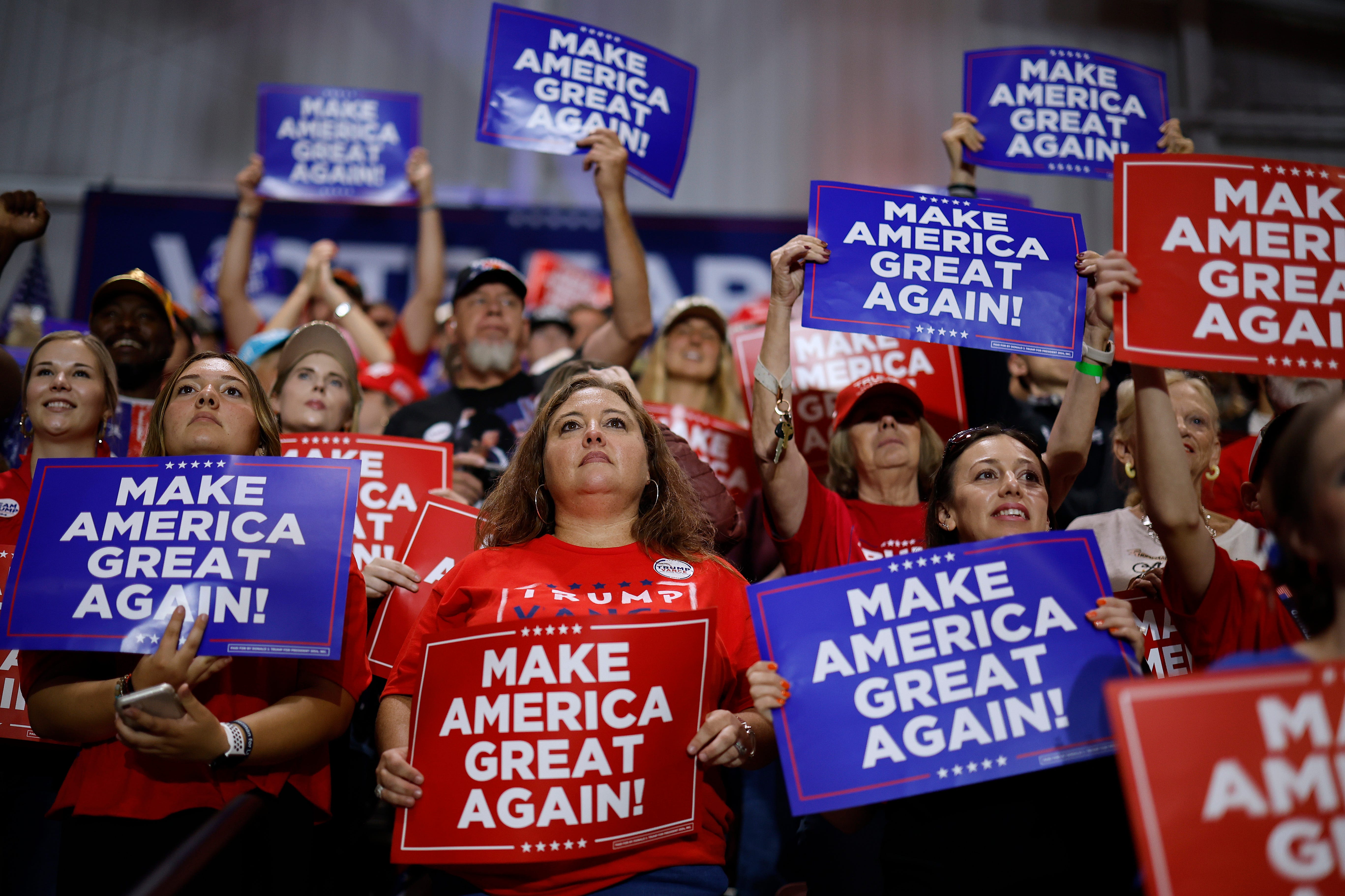 Supporters listen to former President Donald Trump campaign for reelection on Oct. 30, 2024, in Rocky Mount, N.C.