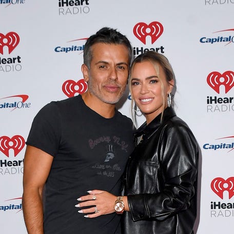Edwin Arroyave and Teddi Mellencamp arrive at the 2022 iHeartRadio Music Festival at T-Mobile Arena on September 23, 2022 in Las Vegas.