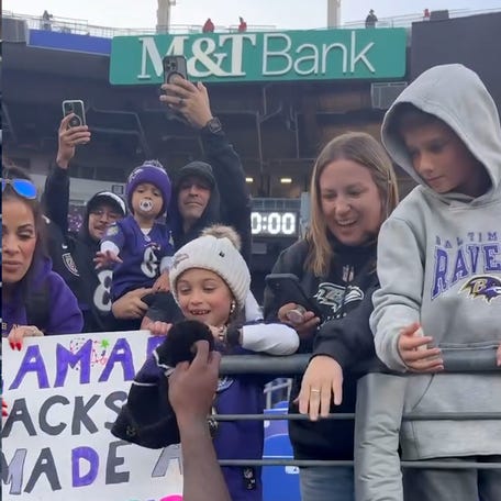 Watch this football fan strike a sweet deal with Baltimore Ravens star Lamar Jackson