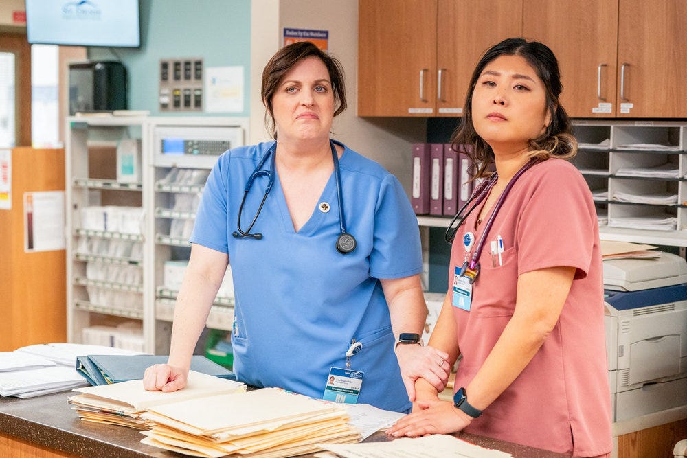 Allison Tolman and Kahyun Kim as nurses Alex and Serena in "St. Denis Medical."