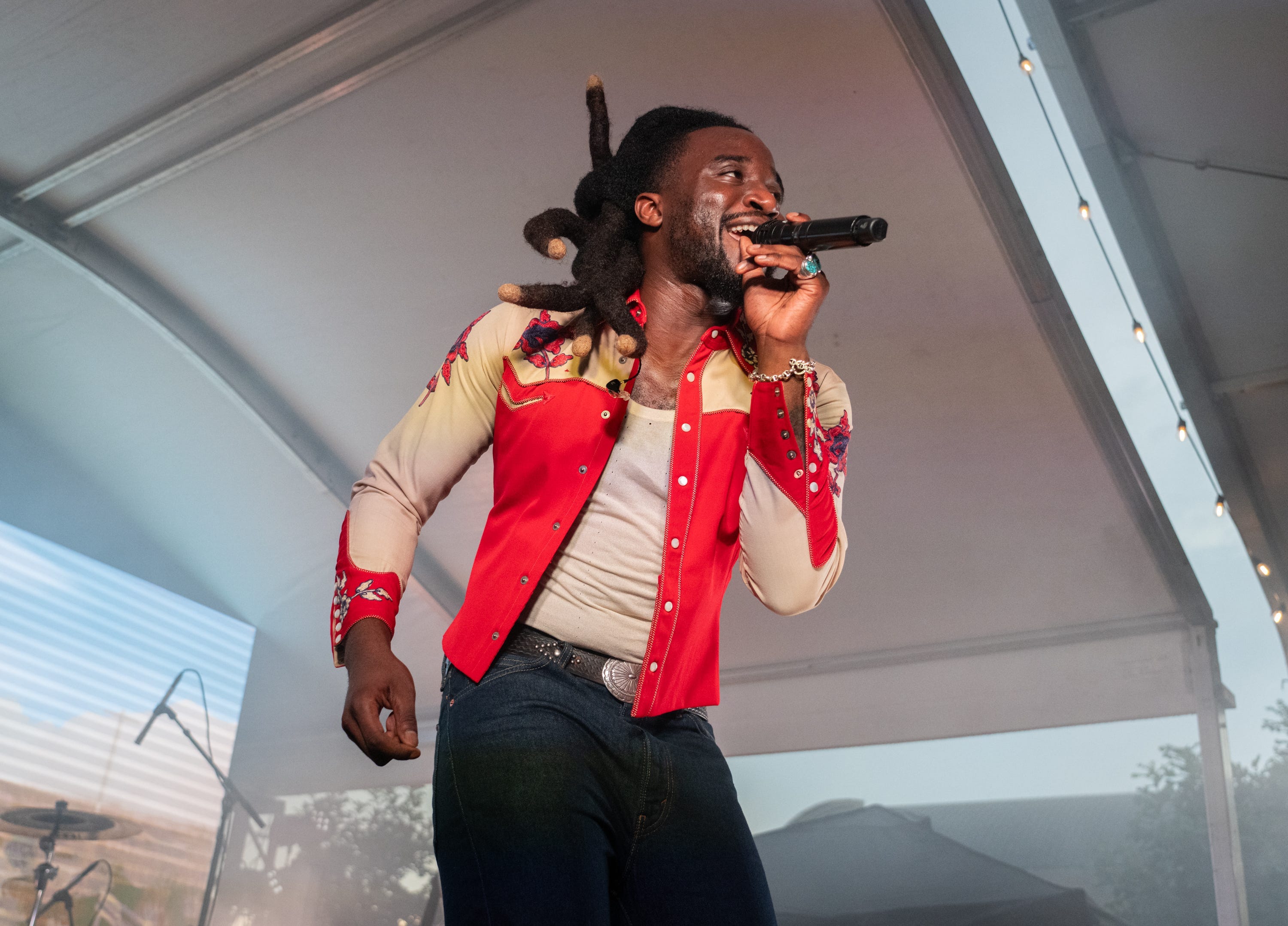 Country artist Shaboozey performs in front of the Moody Center at the Ford Fan Fest ahead of the opening night of Gambler Days in Austin, Aug. 23, 2024.