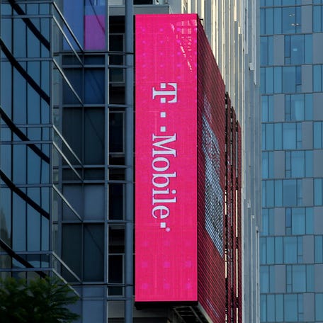 A T-Mobile logo is advertised on a building sign in Los Angeles, California, U.S., May 11, 2017.