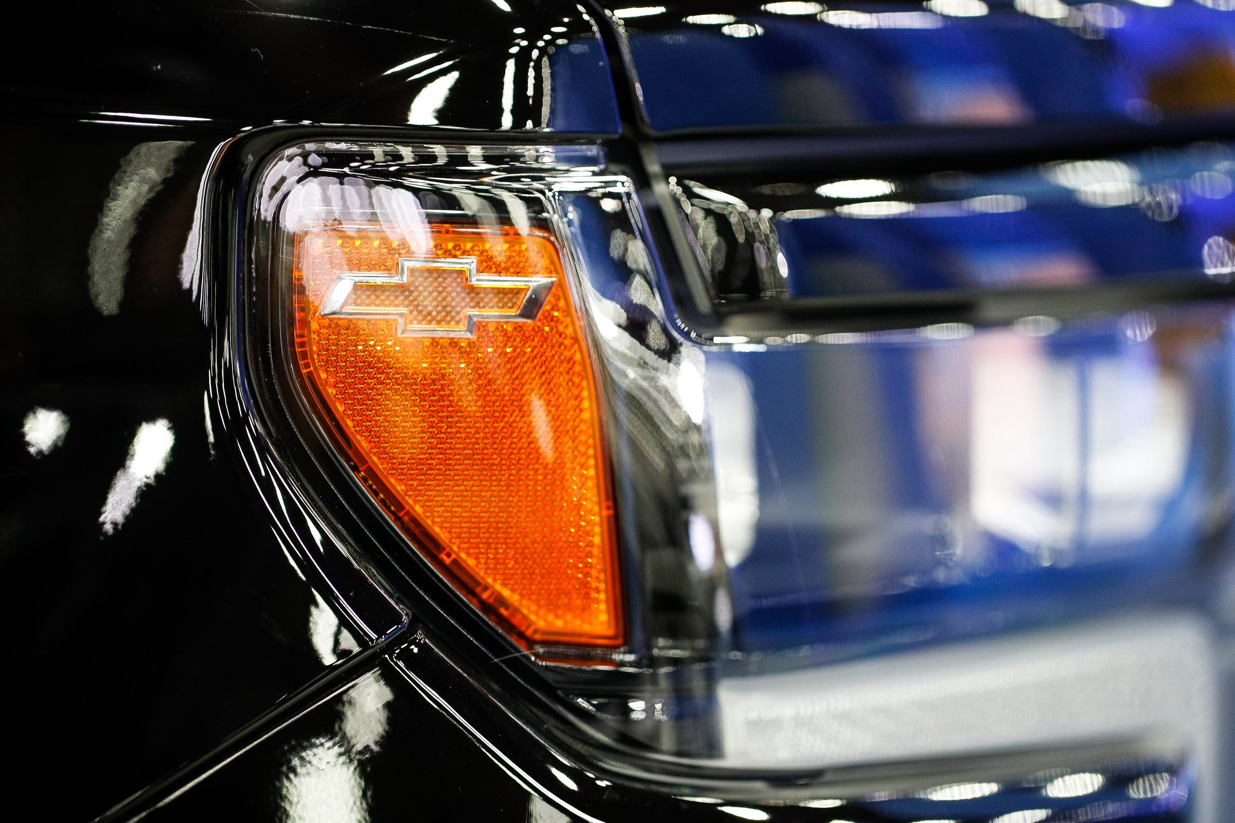 Chevrolet logo on a Chevrolet SUV during the 2023 North American International Auto Show held in downtown Detroit on Sept. 13, 2023. GM is recalling nearly 80,000 2022-2023 Chevrolet Express and GMC Savana vehicles.