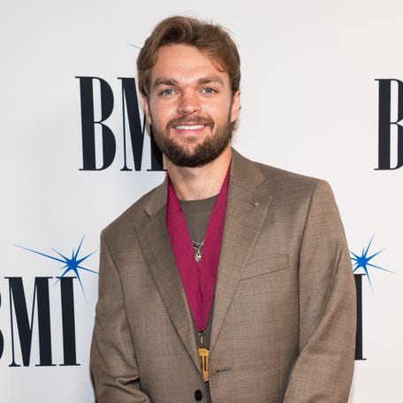 Conner Smith walks the red carpet during the 72nd annual BMI Country Awards in Nashville, Tenn., Tuesday, Nov. 19, 2024.